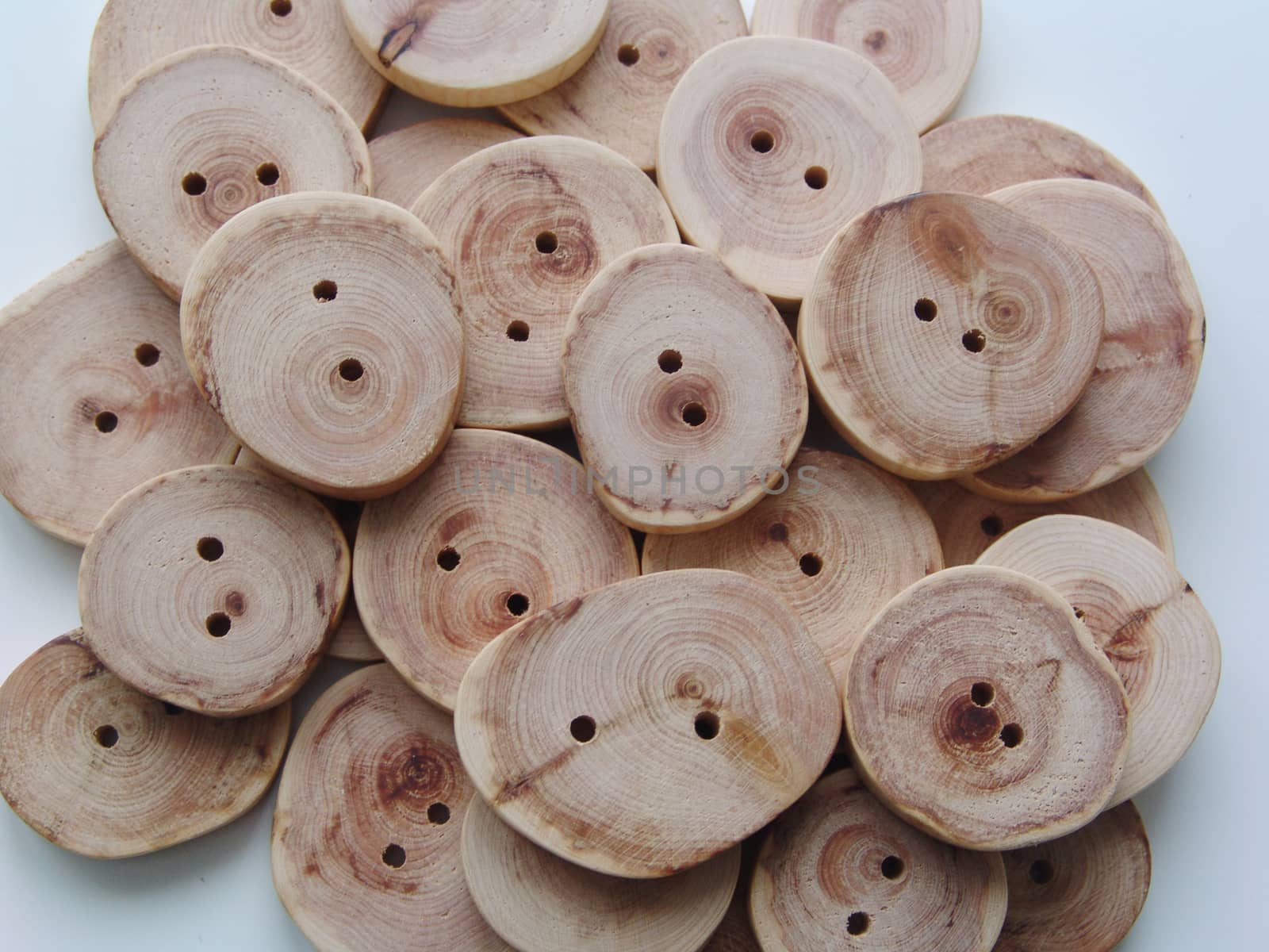 Handicraft goods,  wooden beads. Buttons . Background