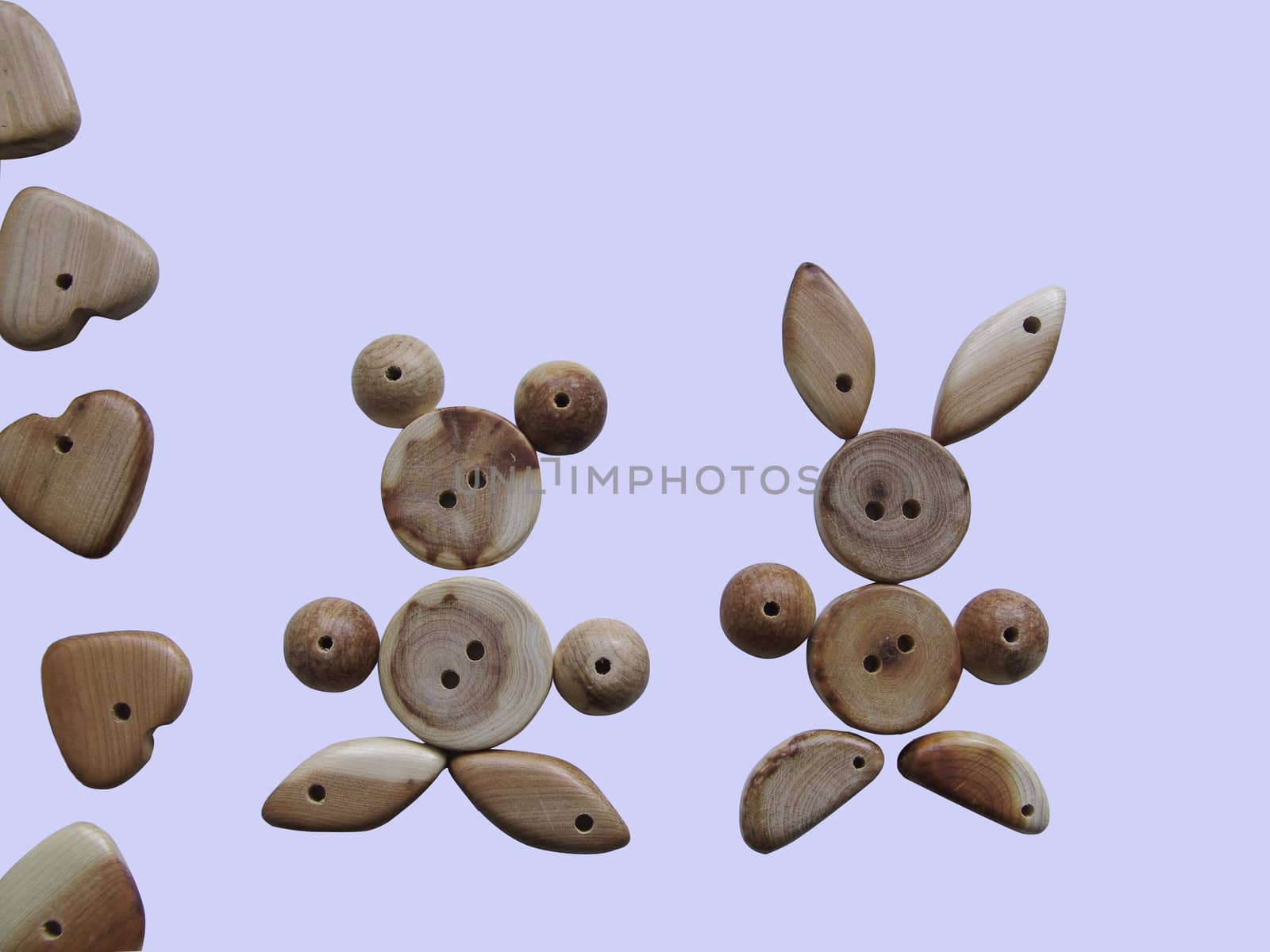 Handicraft goods,  wooden beads. Two animals. Background