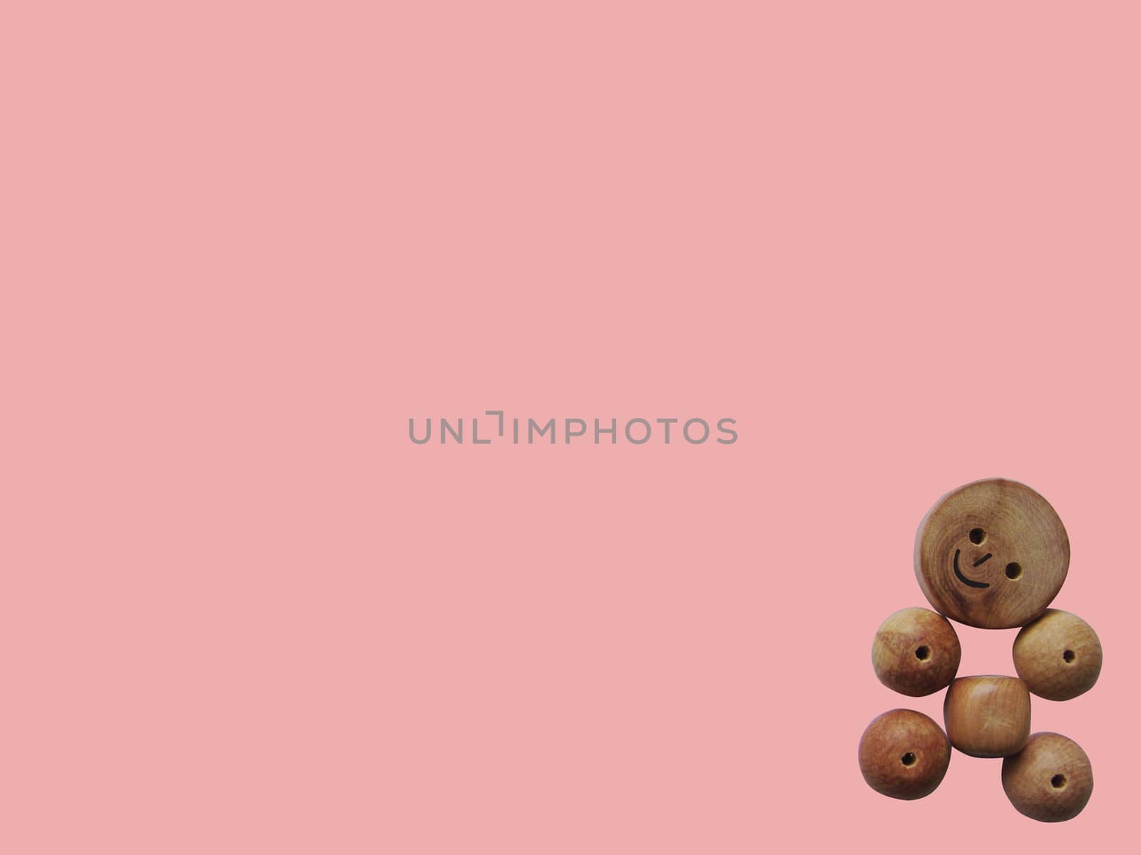 Handicraft goods,  wooden beads. Baby. Background by elena_vz