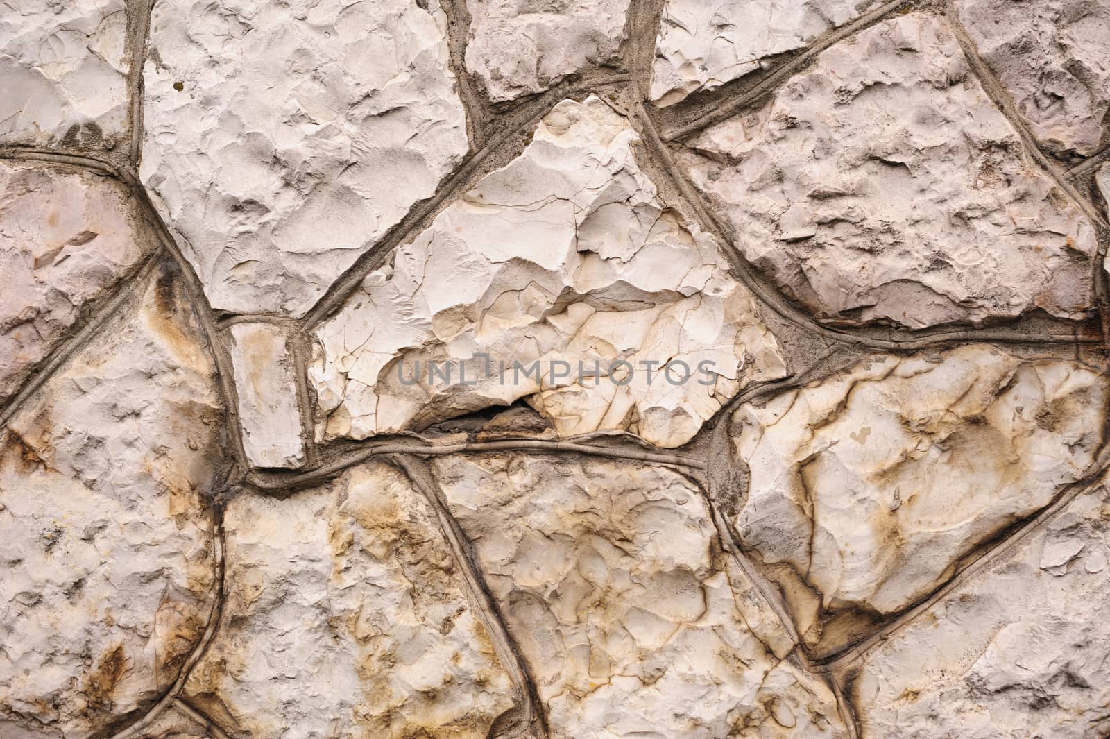 Natural stone wall texture for background by timonko