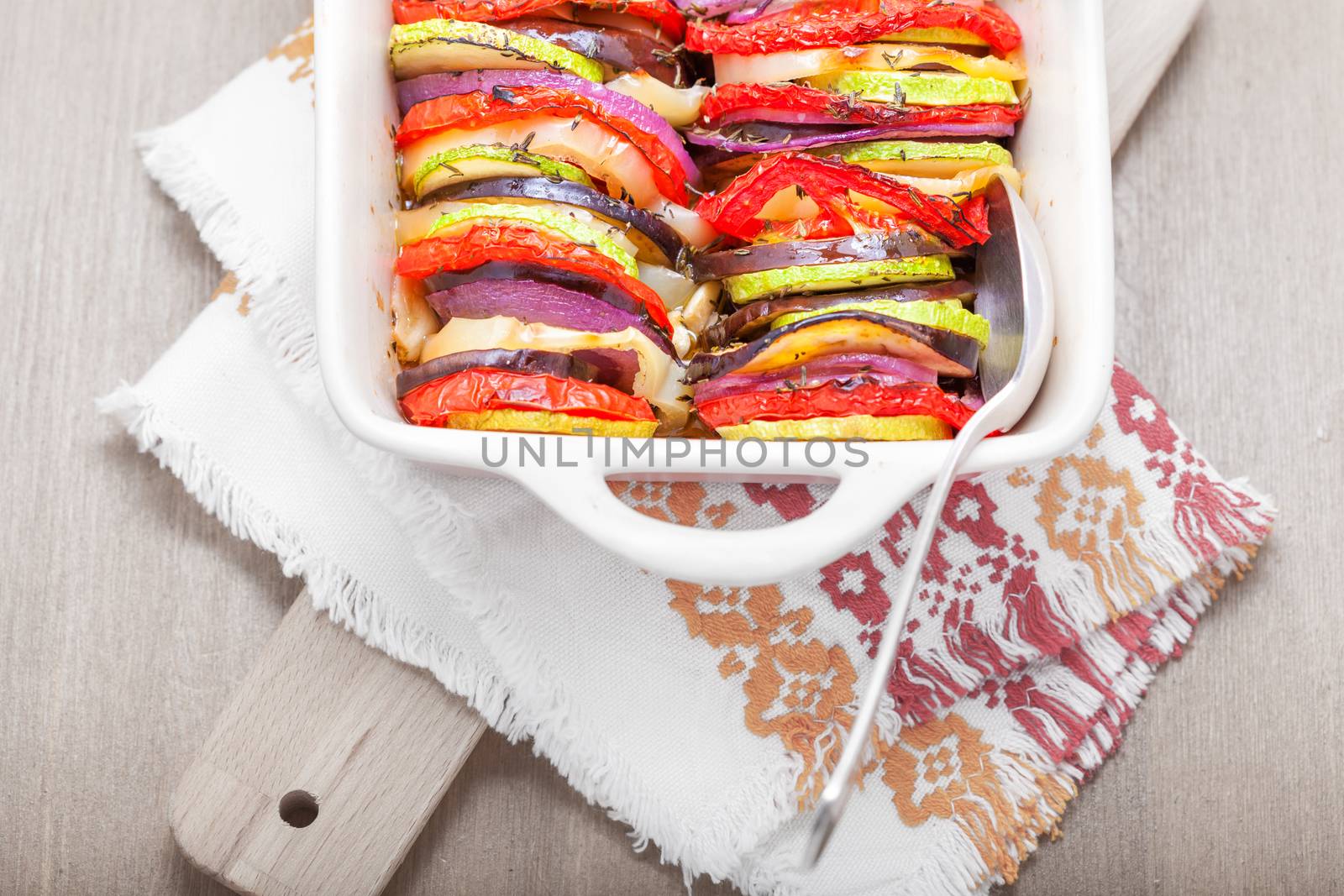 Tian vegetable casserole served on a table.