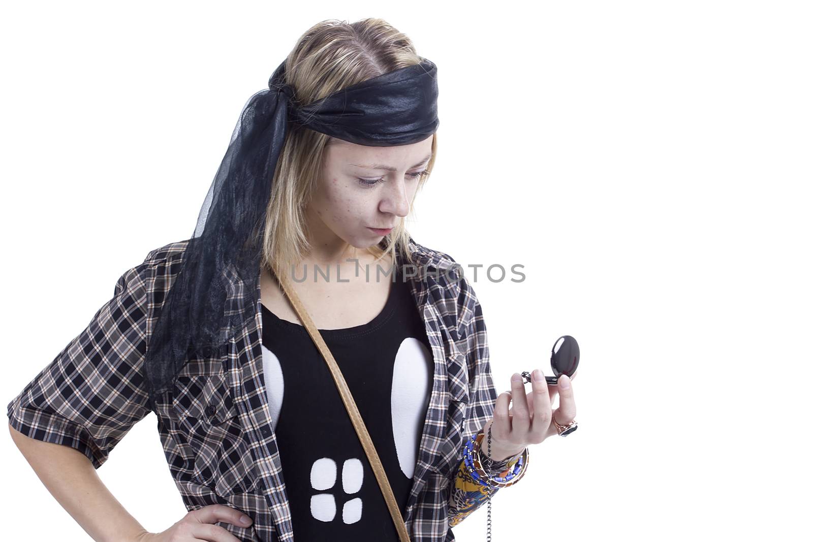 Young woman in the image of a pirate on a white background