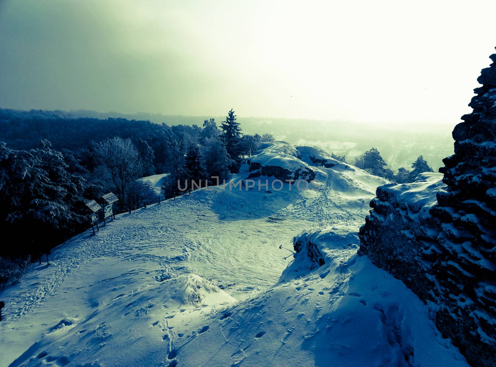 the extraordinary beauty of the winter landscape on top of a hill blue by Oleczka11