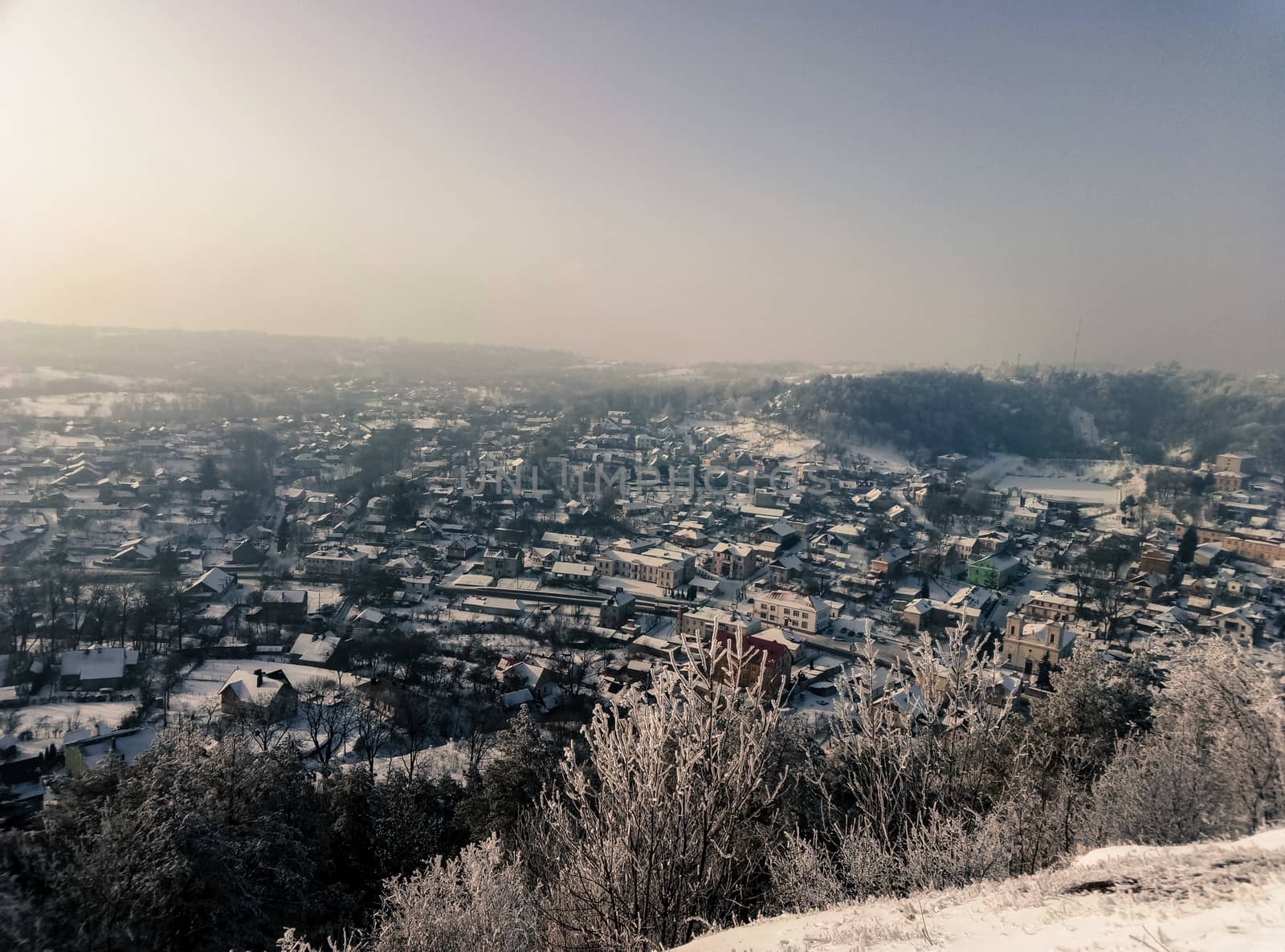 retro beautiful view of a winter city from atop the mountain