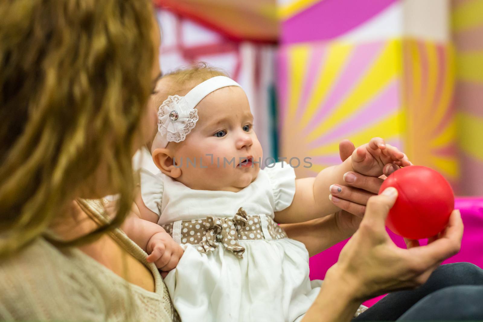 mother and child play in the children's room