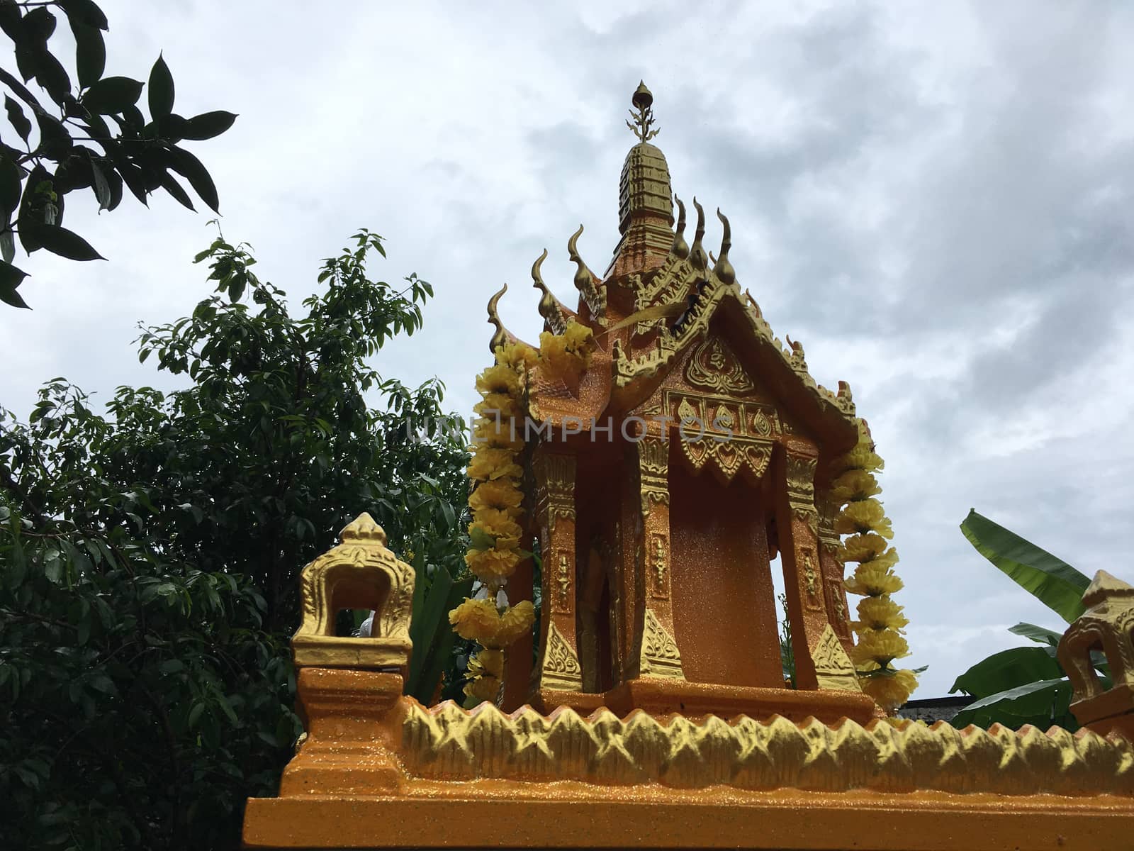 Tai religion house for spirit for worshiping. Small Buddhist temple in garden