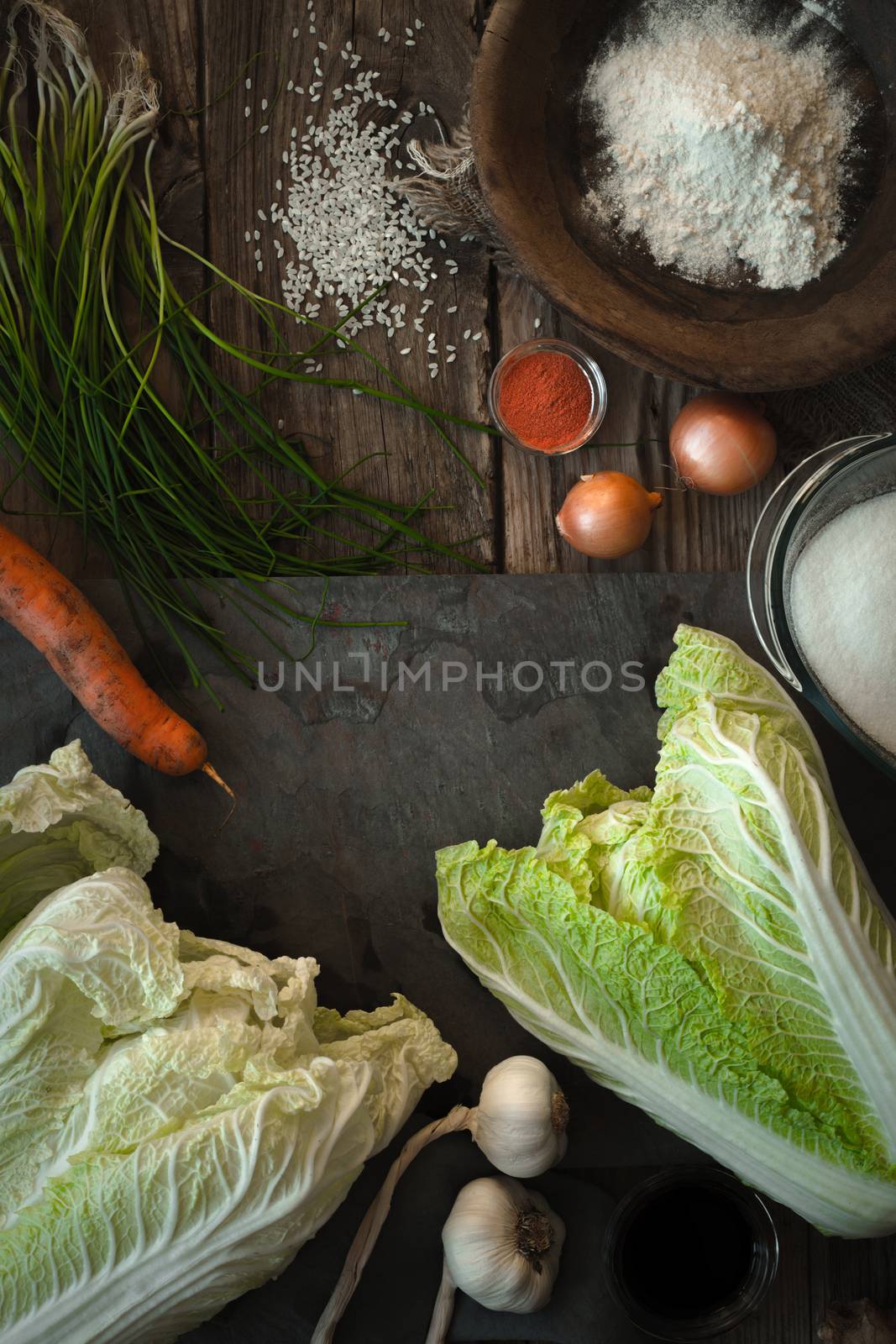 Frame of the ingredients for kimchi on the table vertical