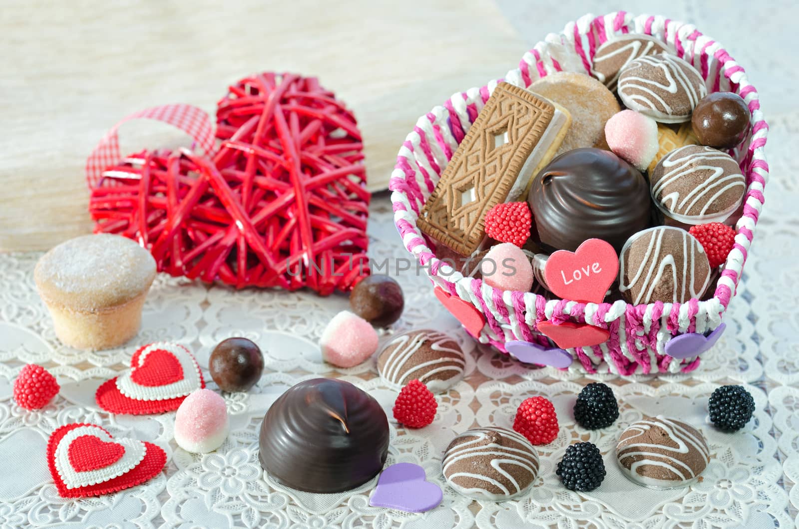 , Basket with sweets and biscuits on the table, decorative Valentine day heart by Gaina