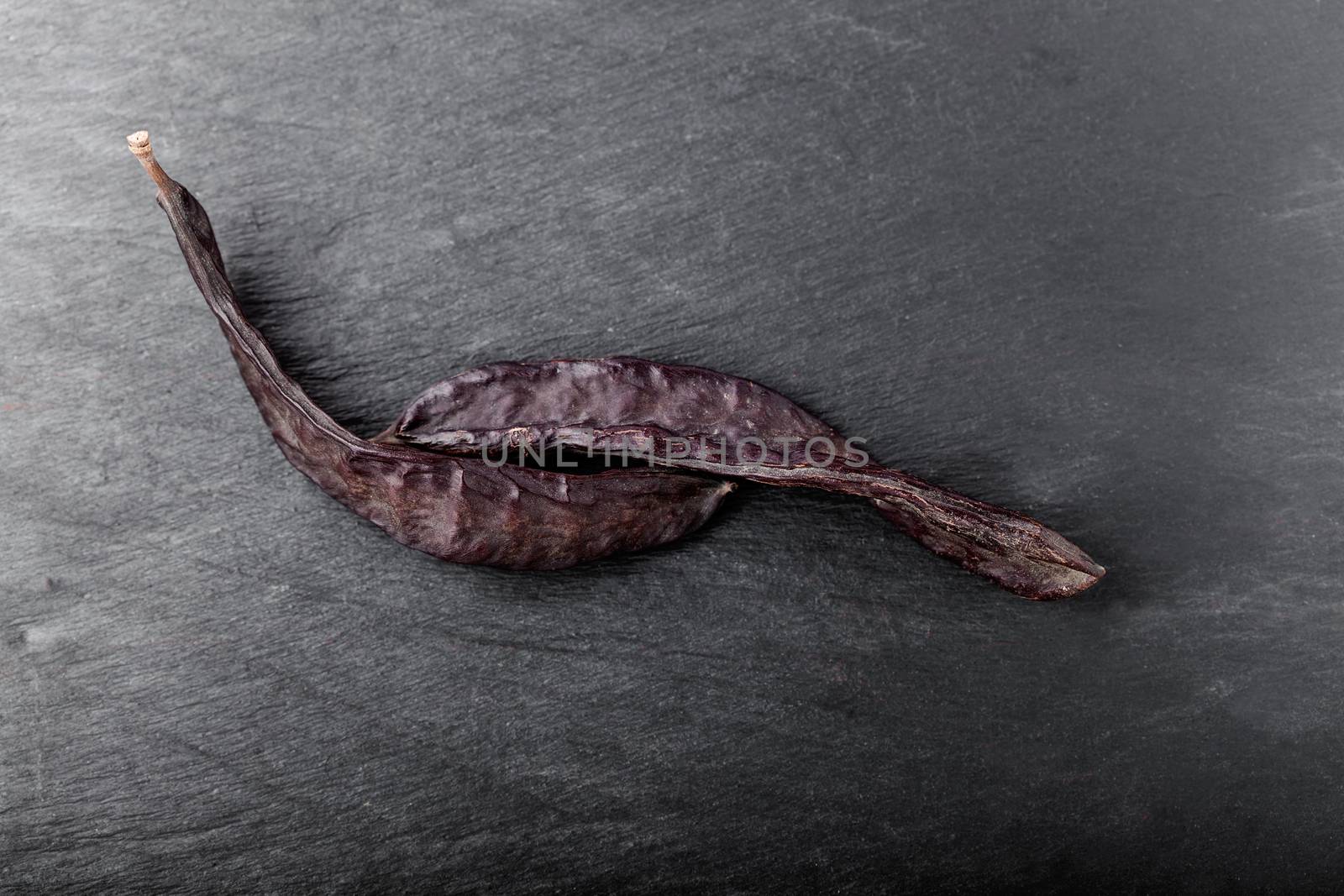 Carob on a stone plate by supercat67