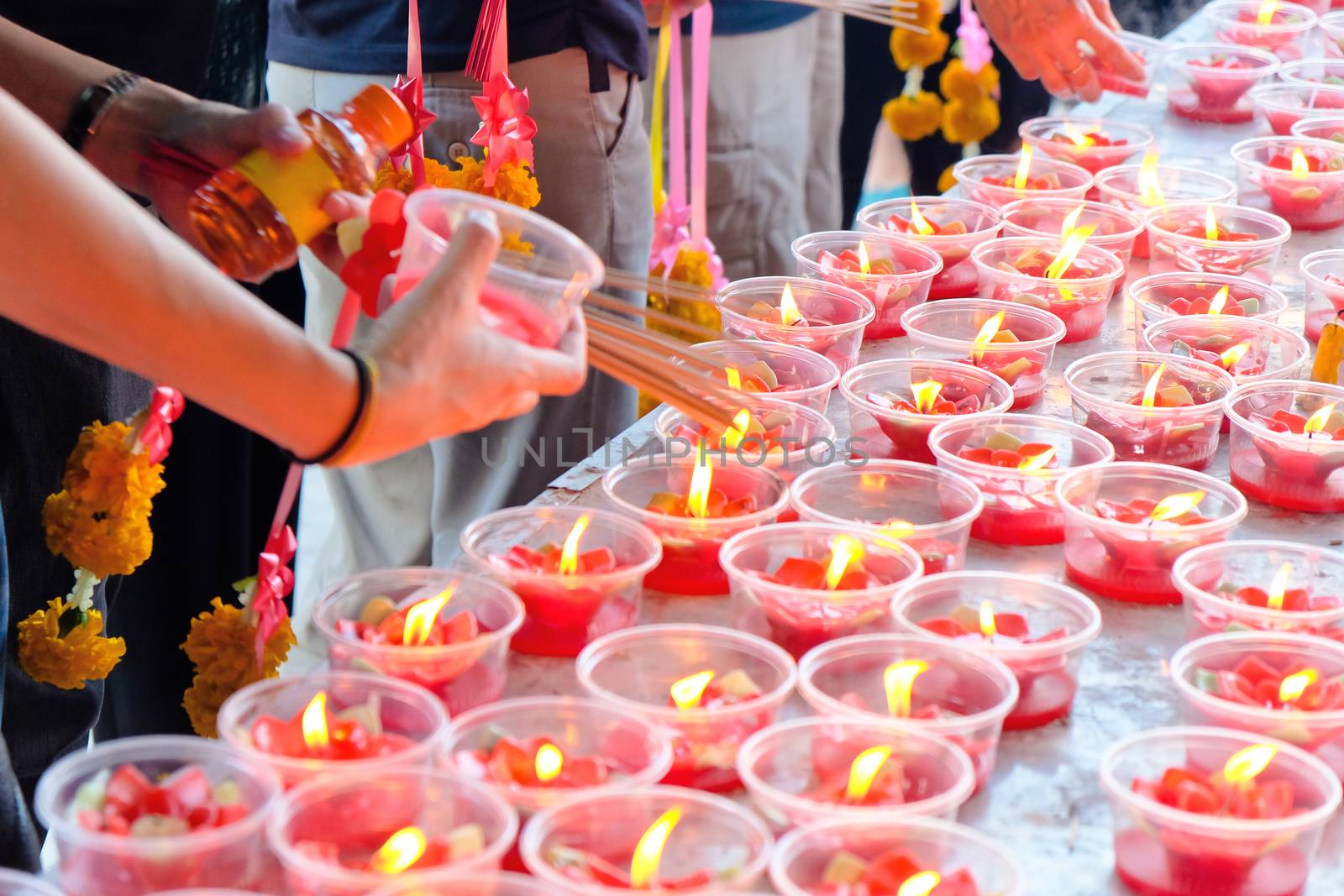 People light the candle at chinese temple