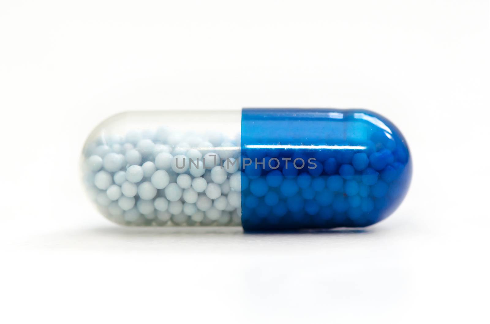 Lot of pills capsules close up by simpson33