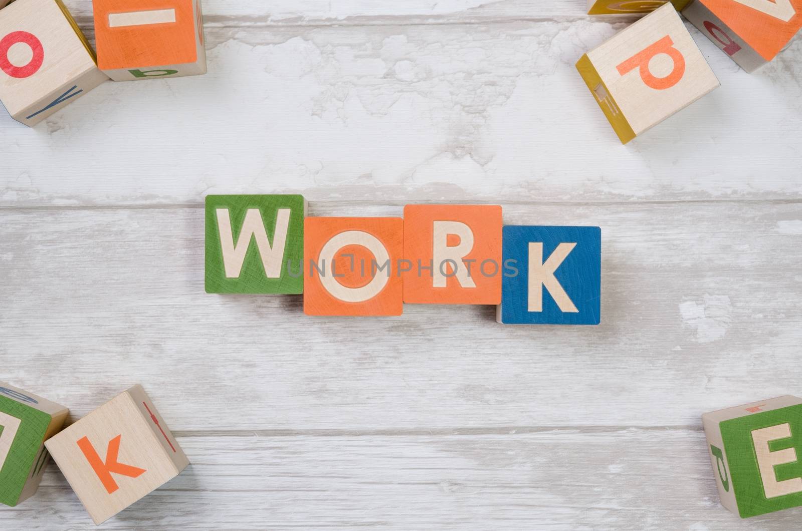 WORK word with colorful blocks. work job business leadership word cube block top view