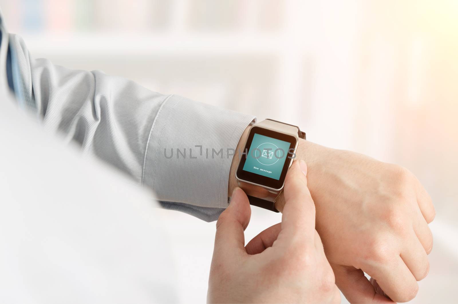 Man using smartwatch with e-mail notifier. smartwatch hand device notify computer internet message e-mail concept