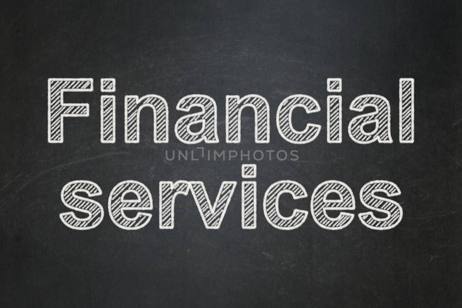 Banking concept: text Financial Services on Black chalkboard background