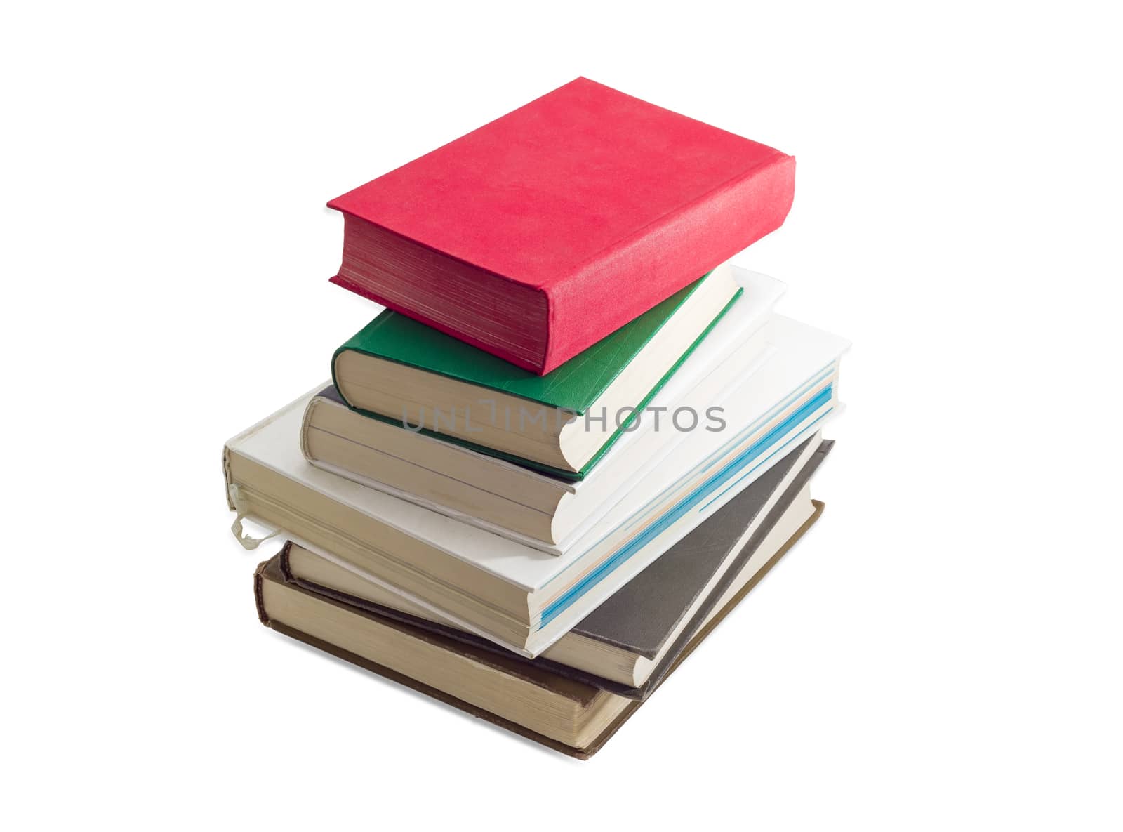 Stack of several books different formats and cover design on a light background
