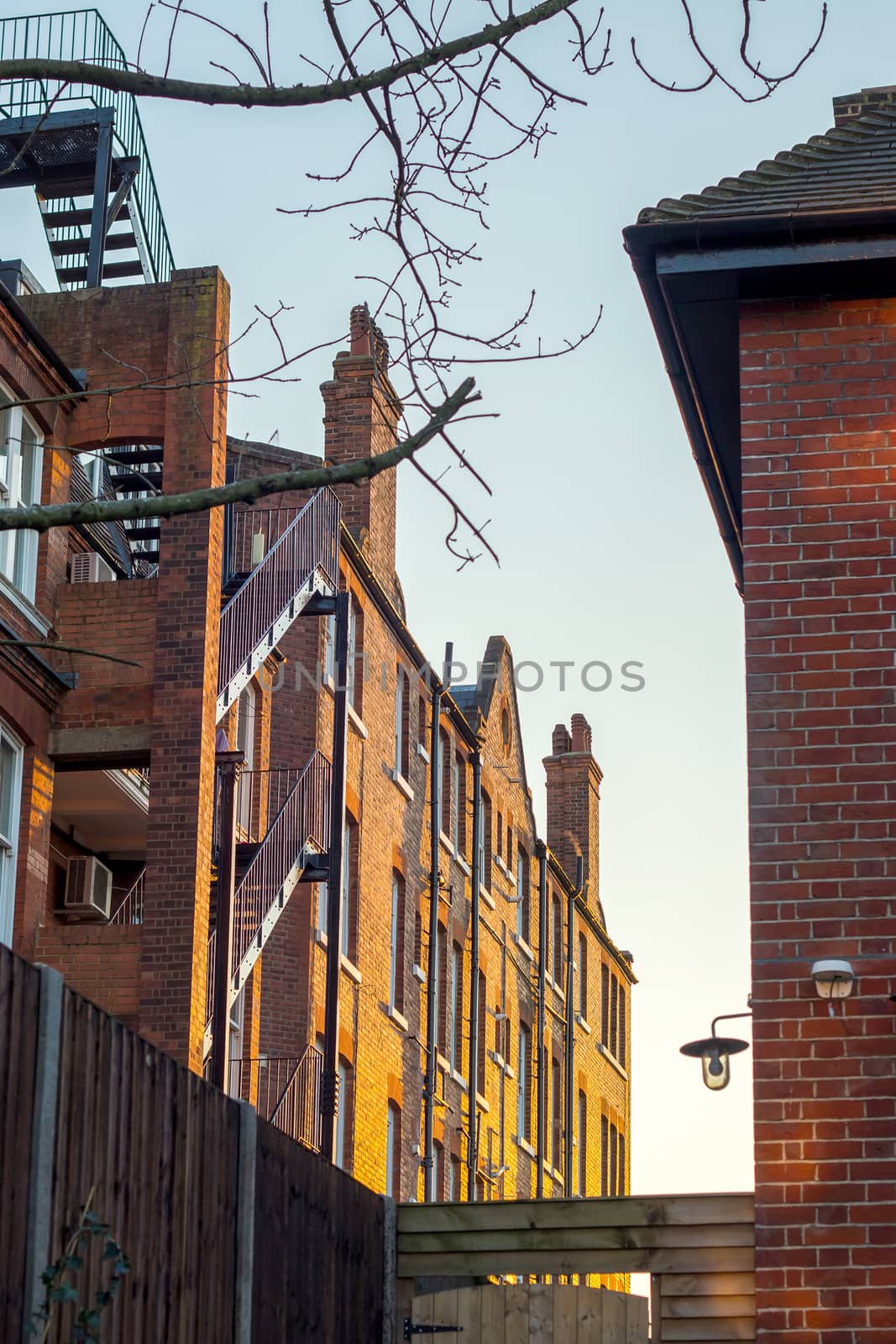 A block of traditional luxury flats in london during the sunset. 
