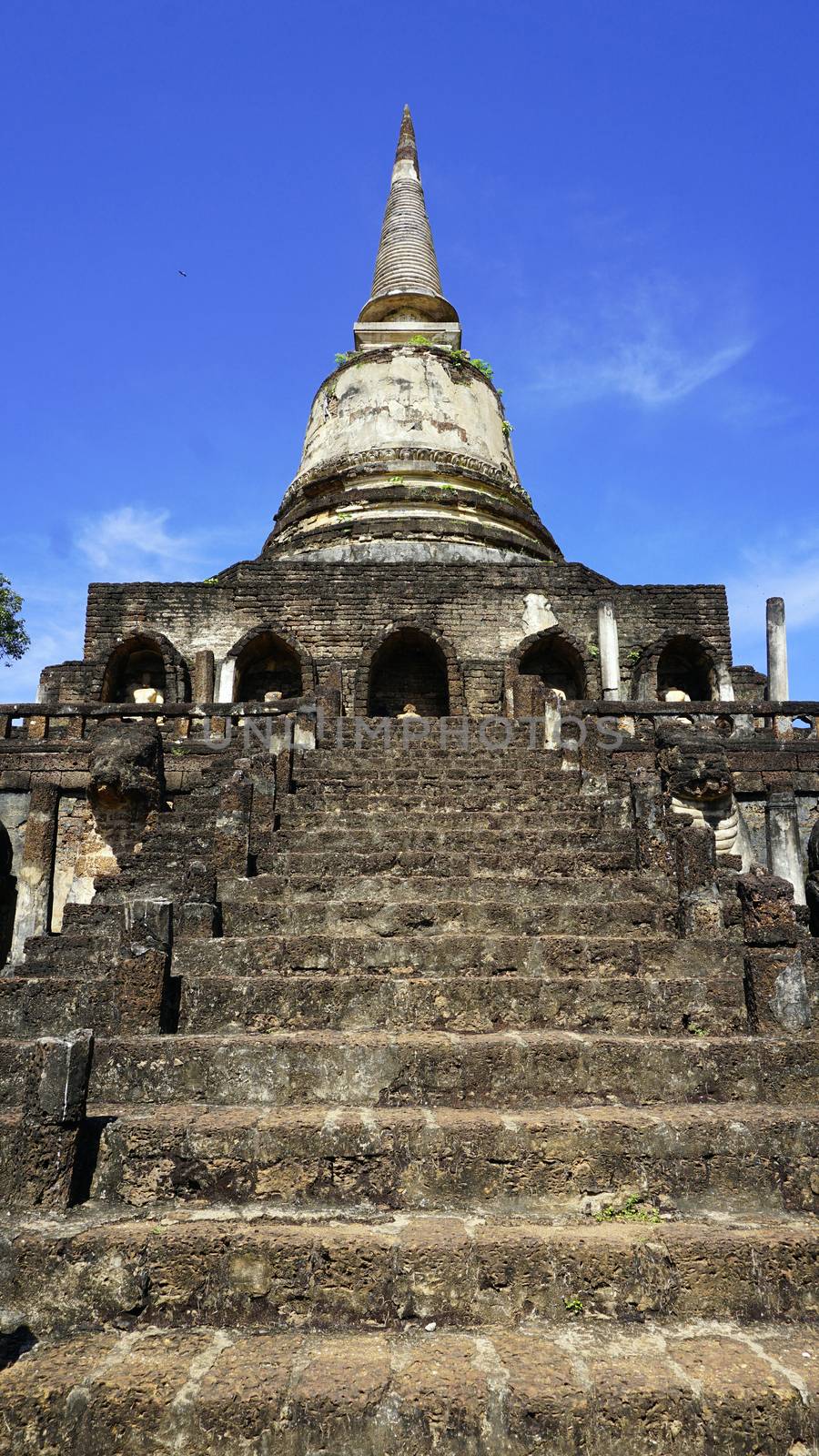 Historical Park Wat chang lom temple pagoda stair in Sukhothai world heritage