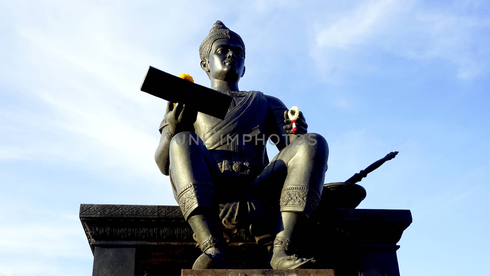 king of sukhothai sculpture front view in Historical park 