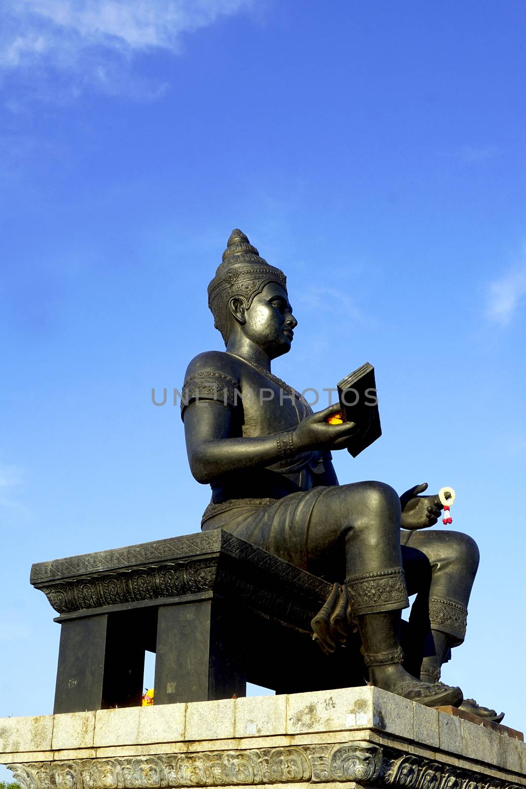 king of sukhothai statue side view in Historical park vertical
