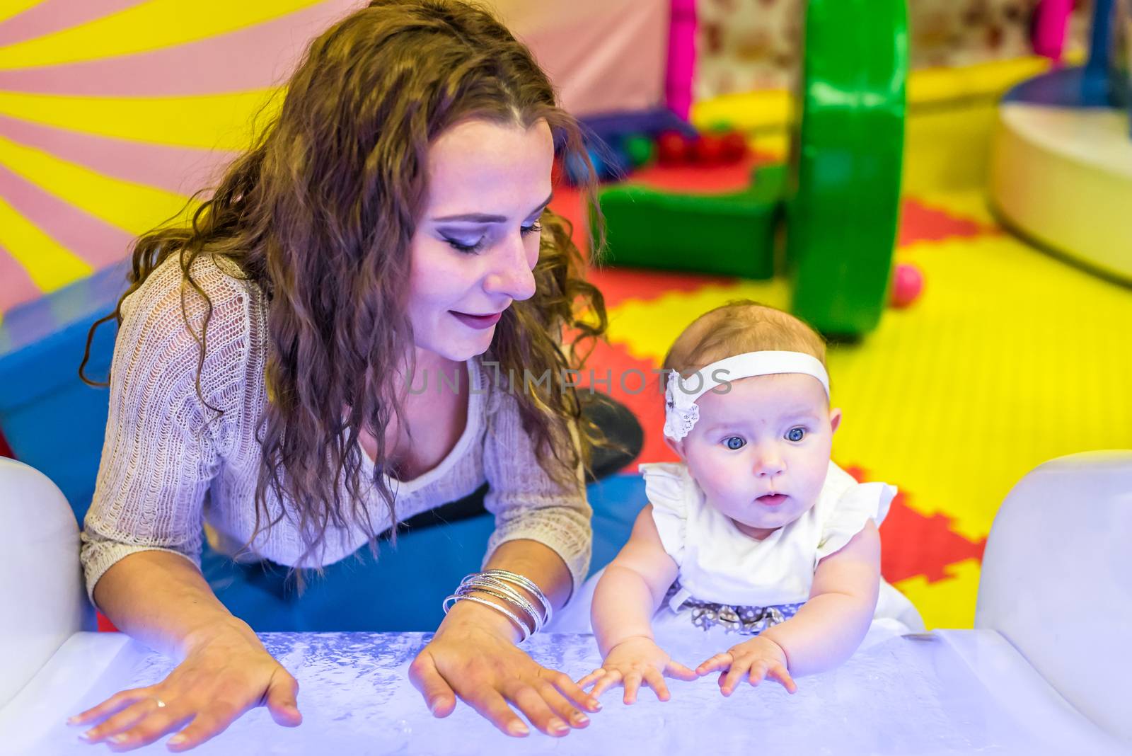 mother and child play in the children's room