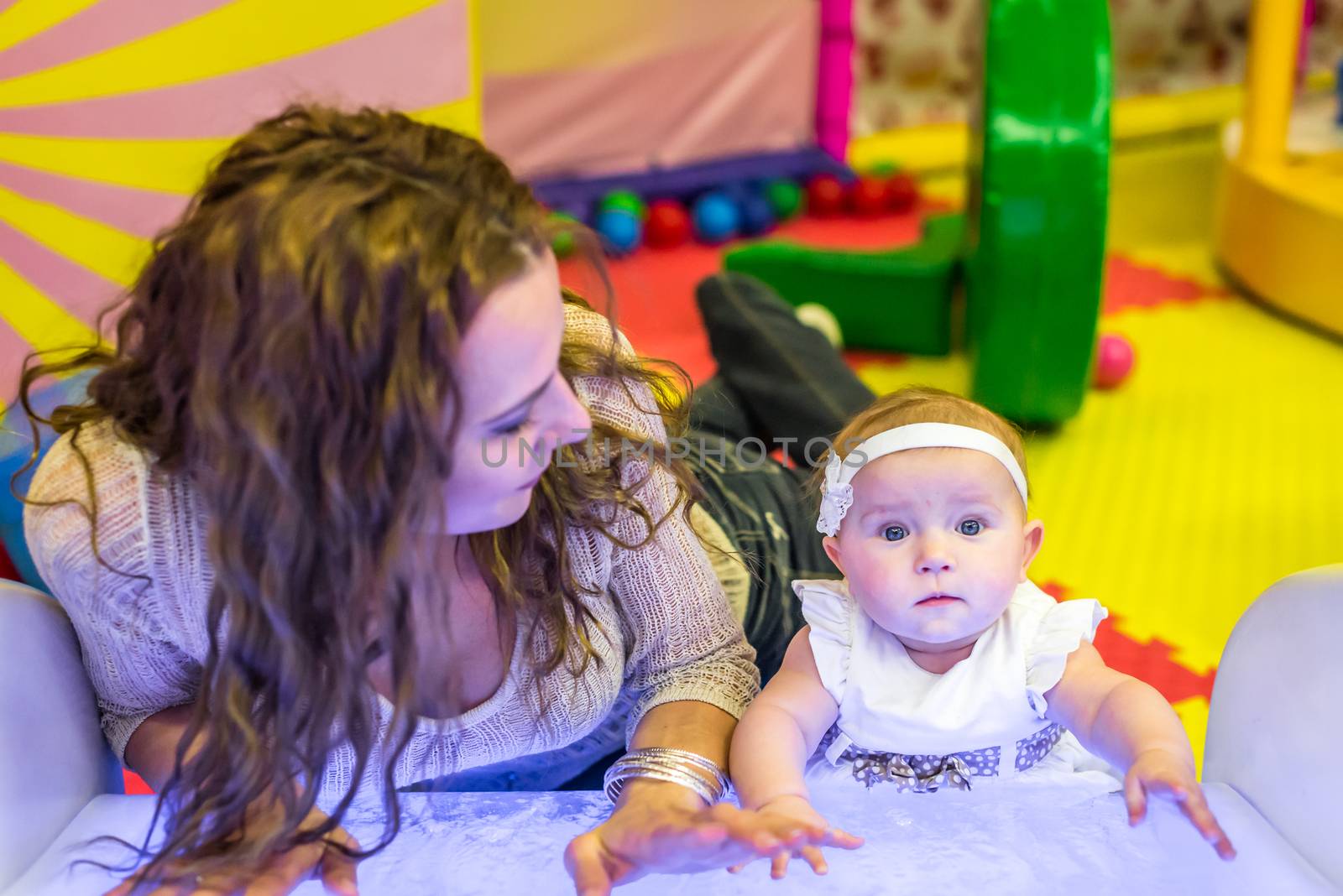 mother and child play in the children's room