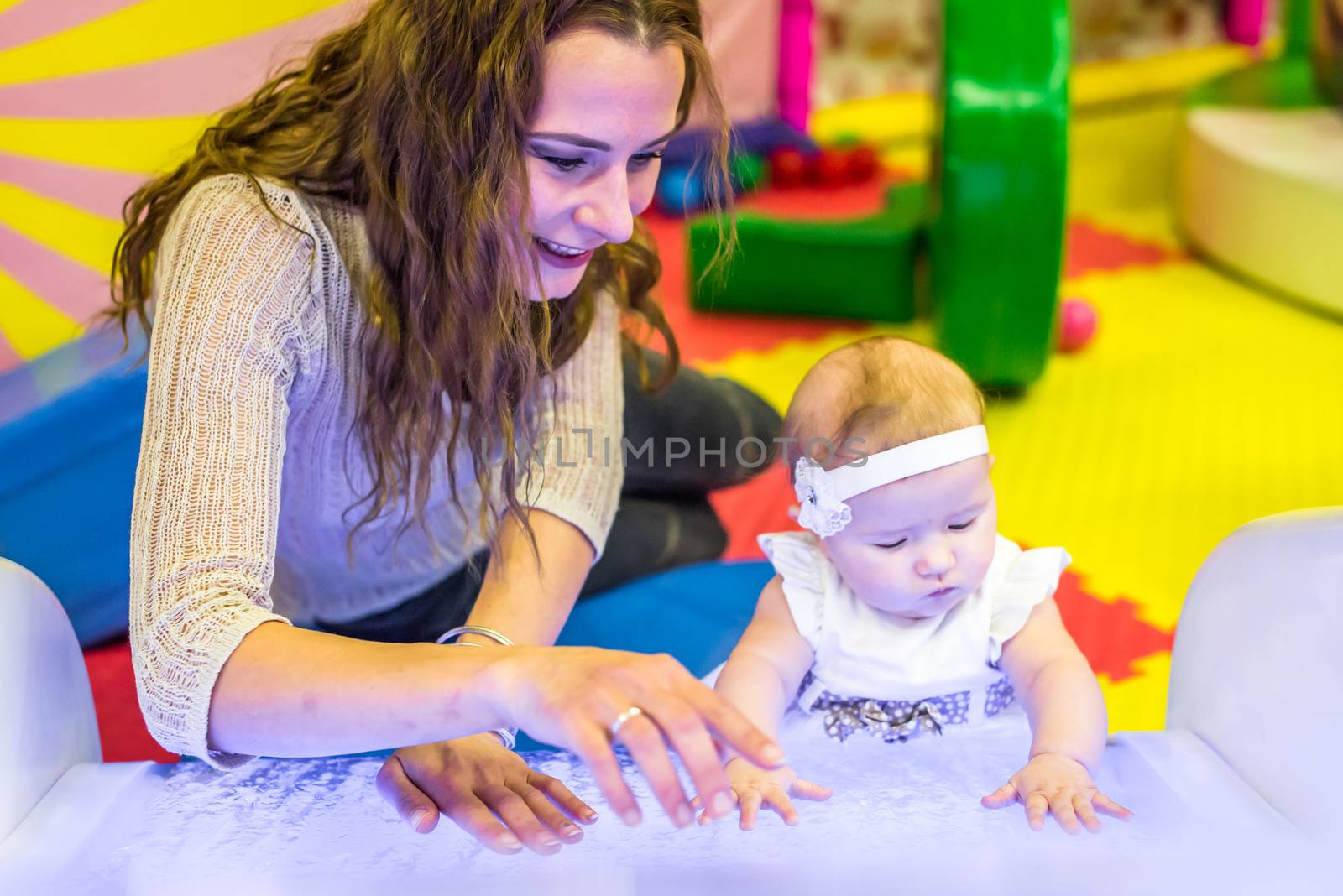 mother and child play in the children's room