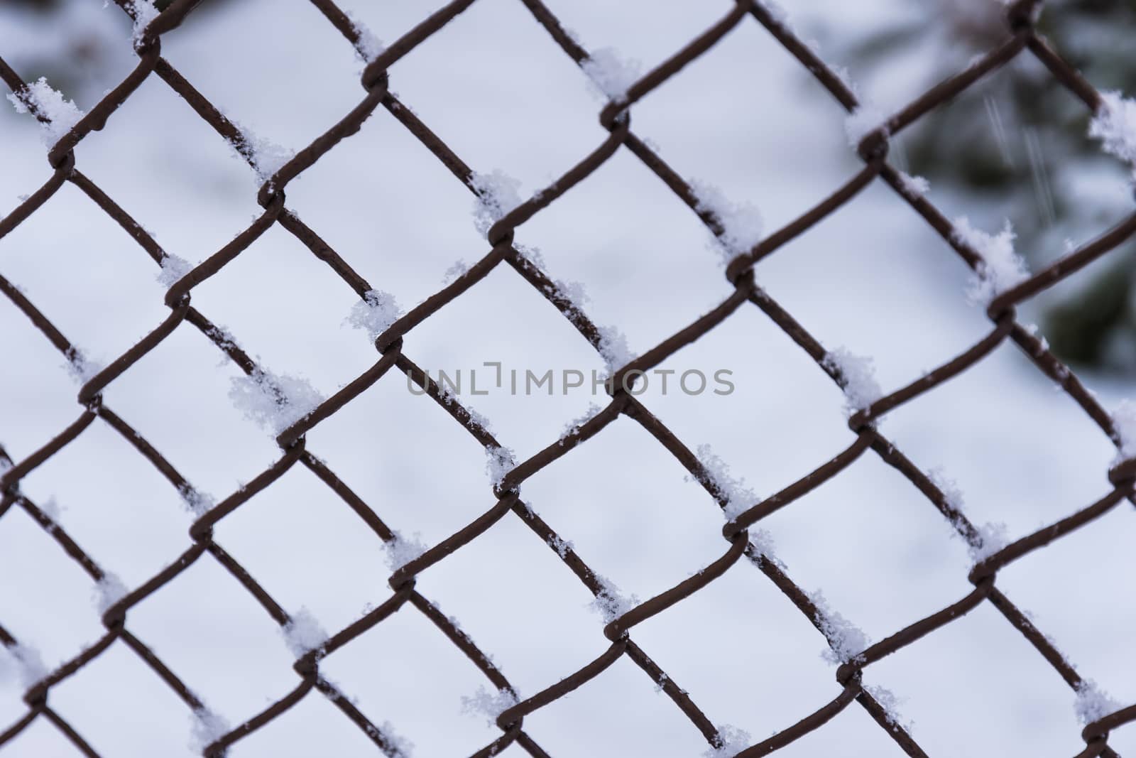 Winter snow fencing, building security, winter texture