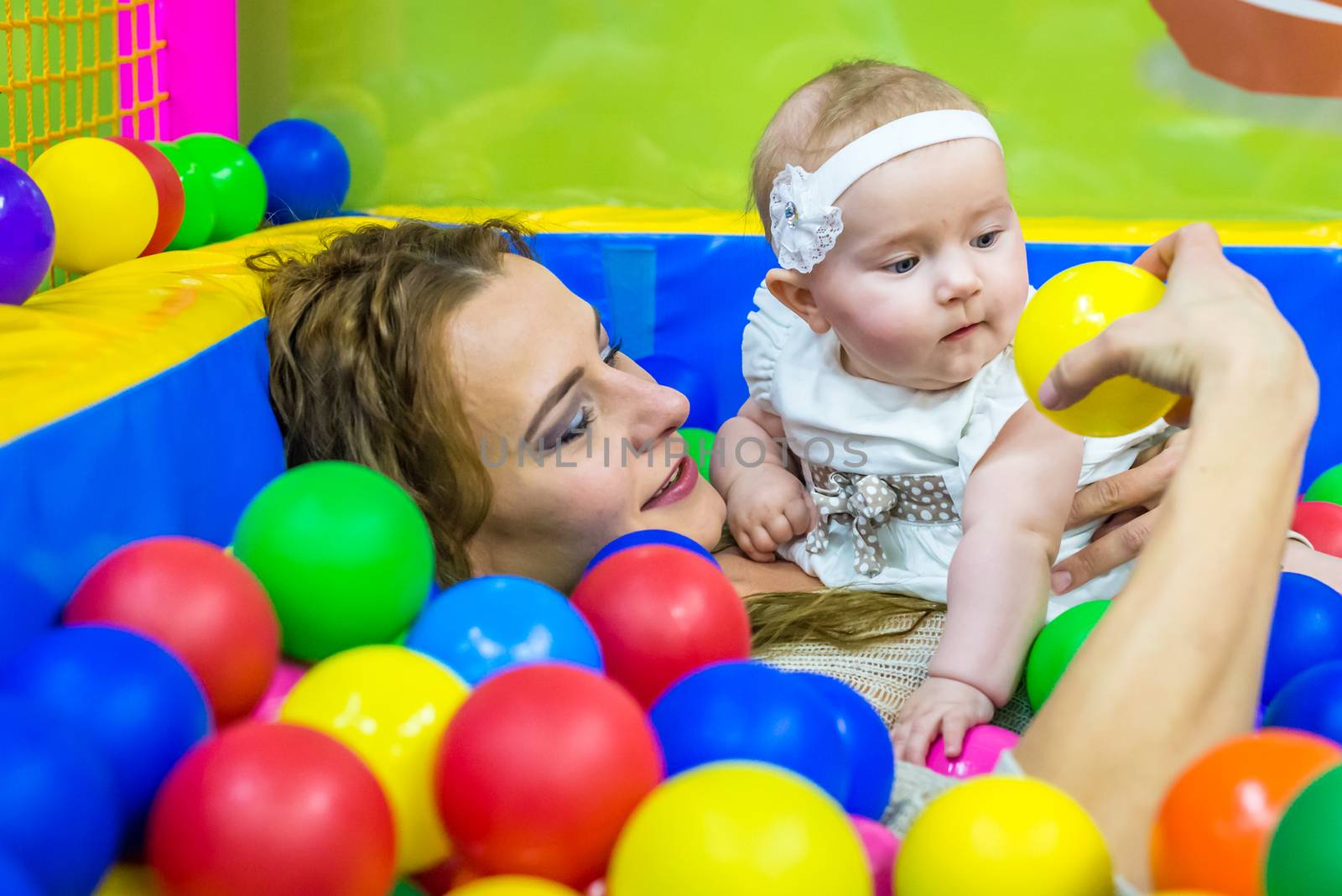 mother and child play in the children's room