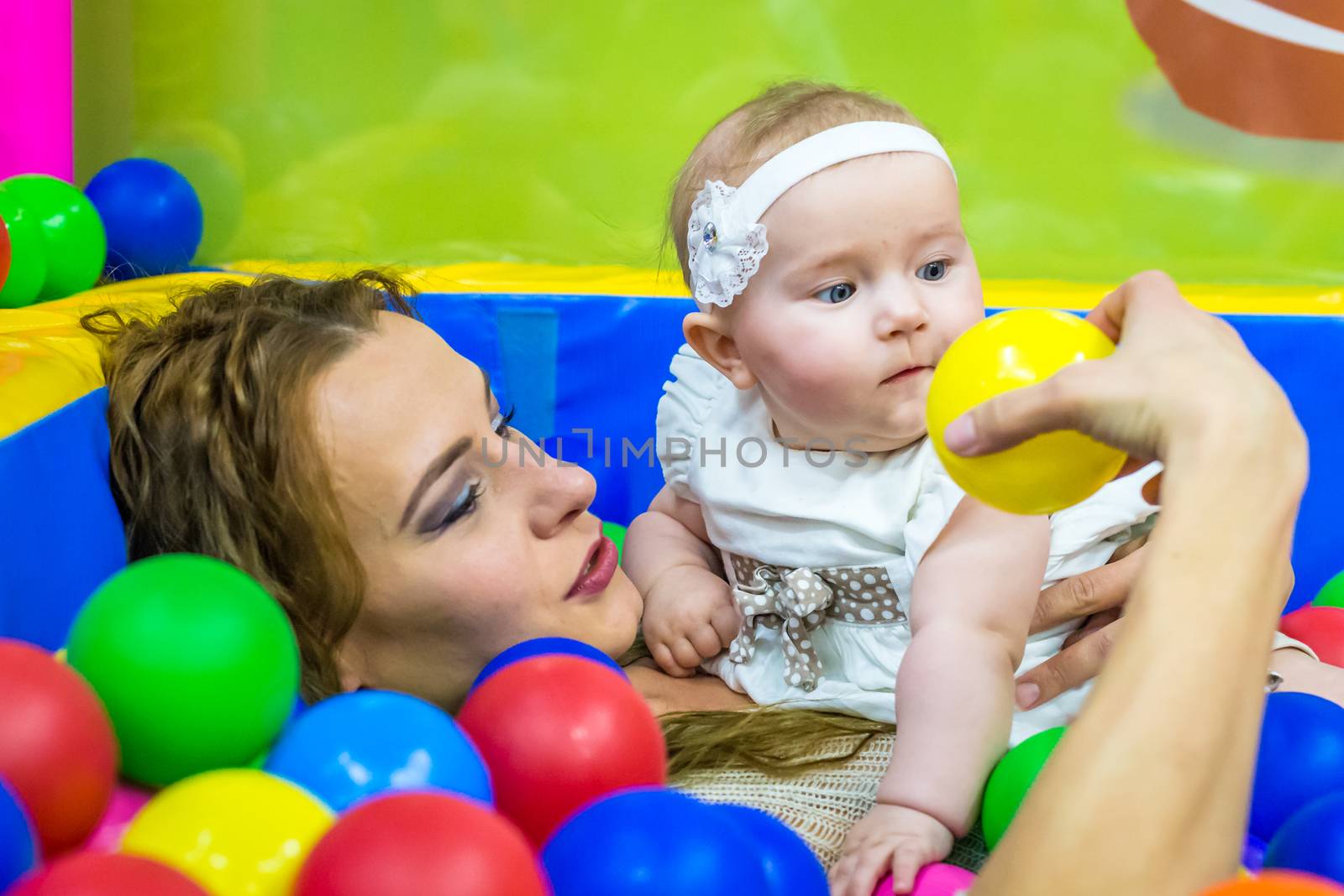 mother and child play in the children's room