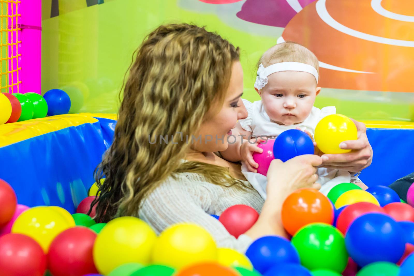 mother and child play in the children's room