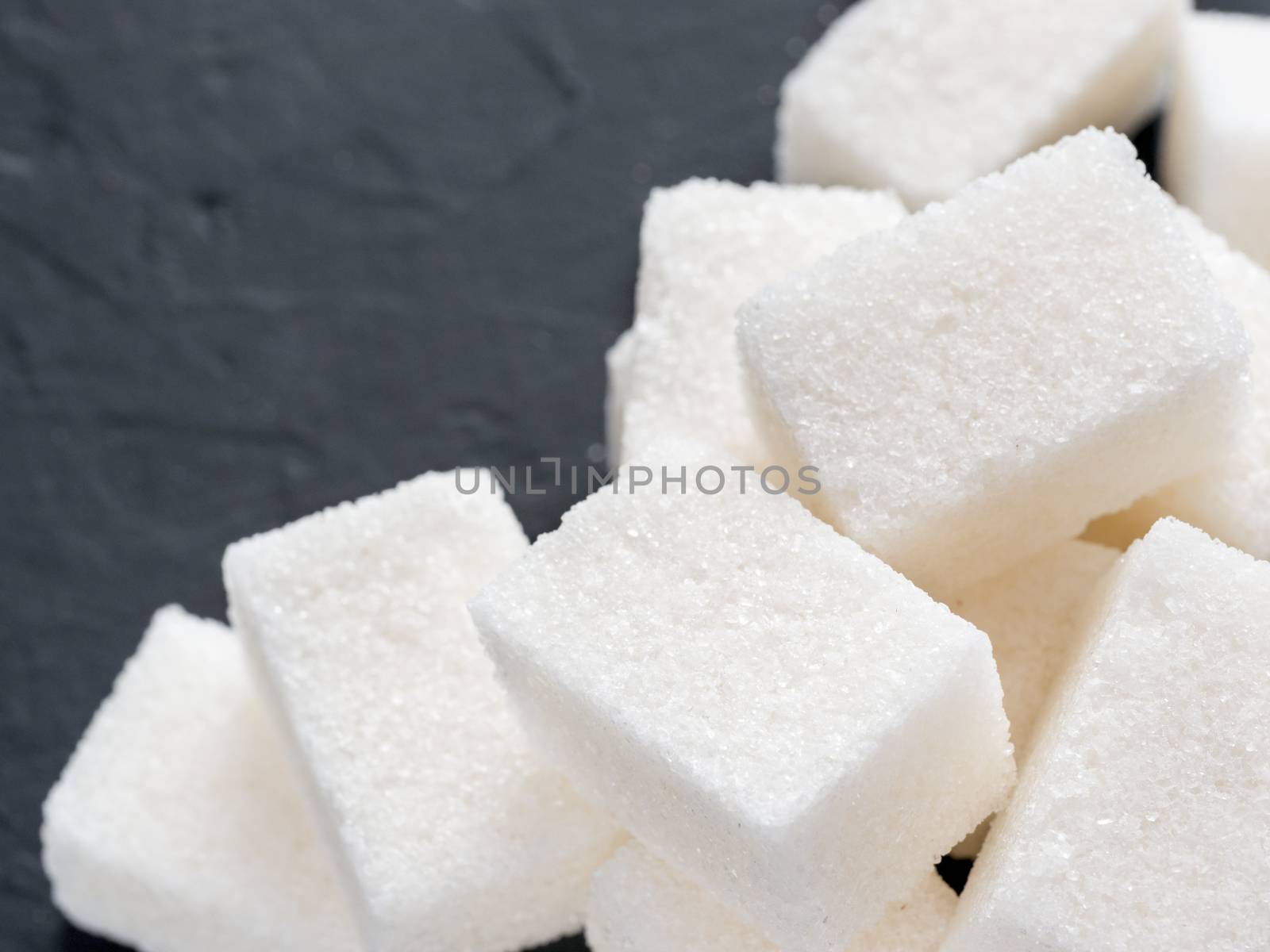 background of white sugar cubes with copy space by fascinadora