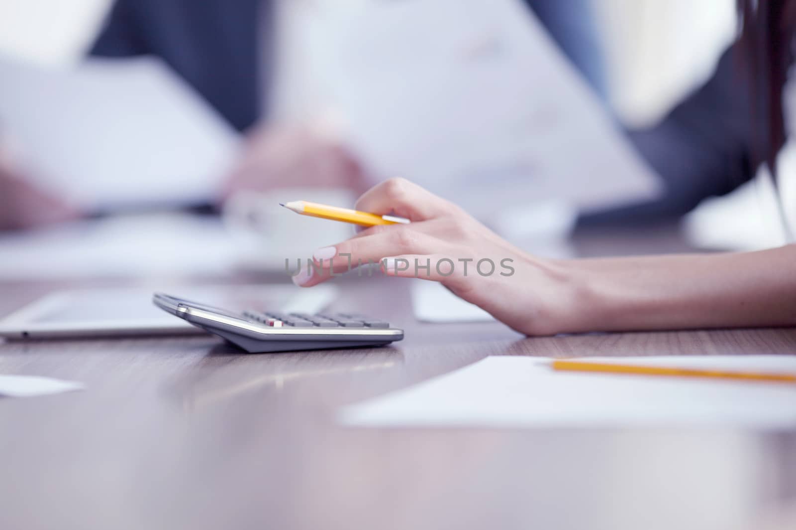 Close-up of Business people working together at meeting