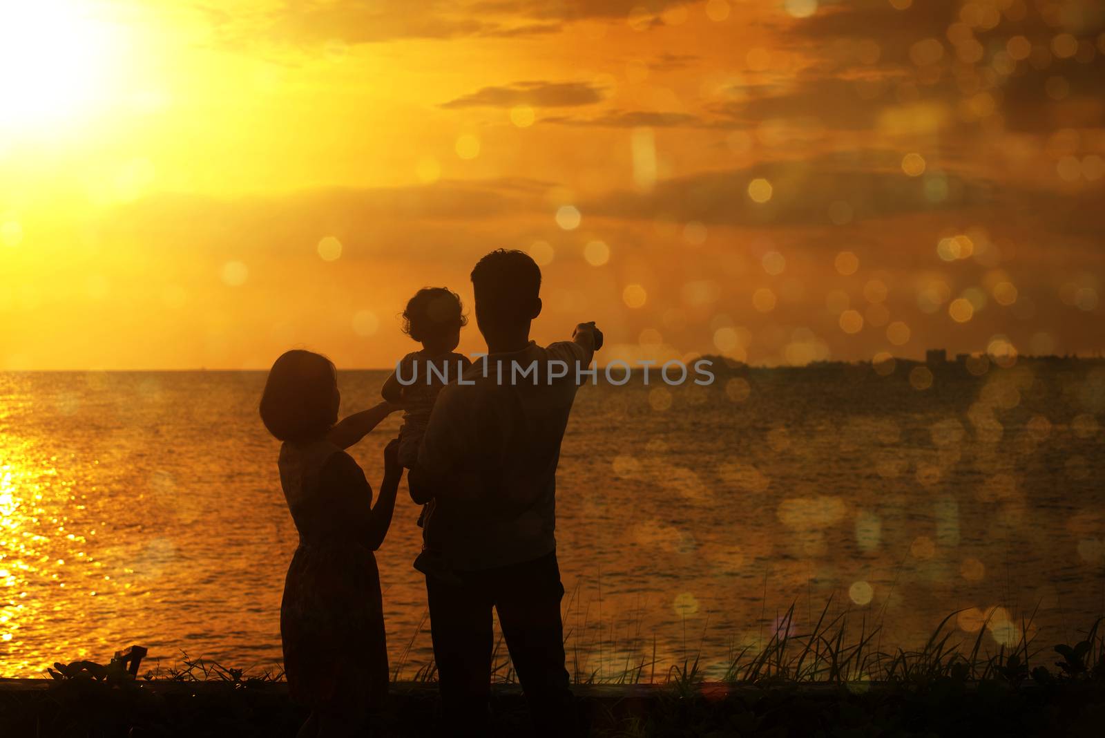 Silhouette of family in outdoor sunset by szefei