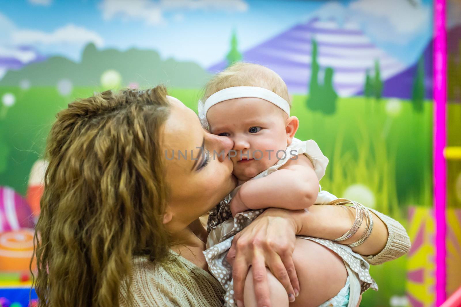 mother and child play in the children's room