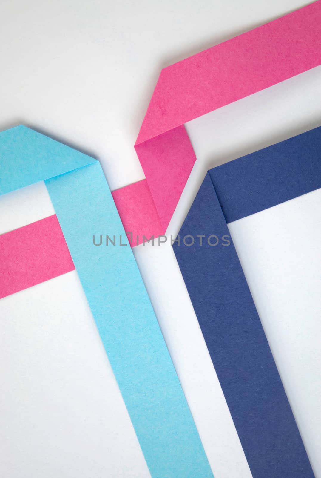 abstract background composition of colored paper ribbons