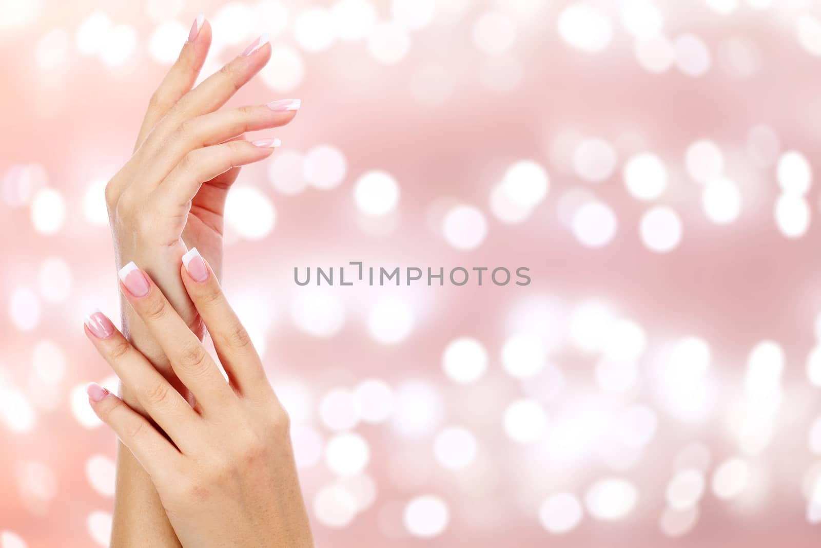 Beautiful woman hands against an abstract background by Nobilior