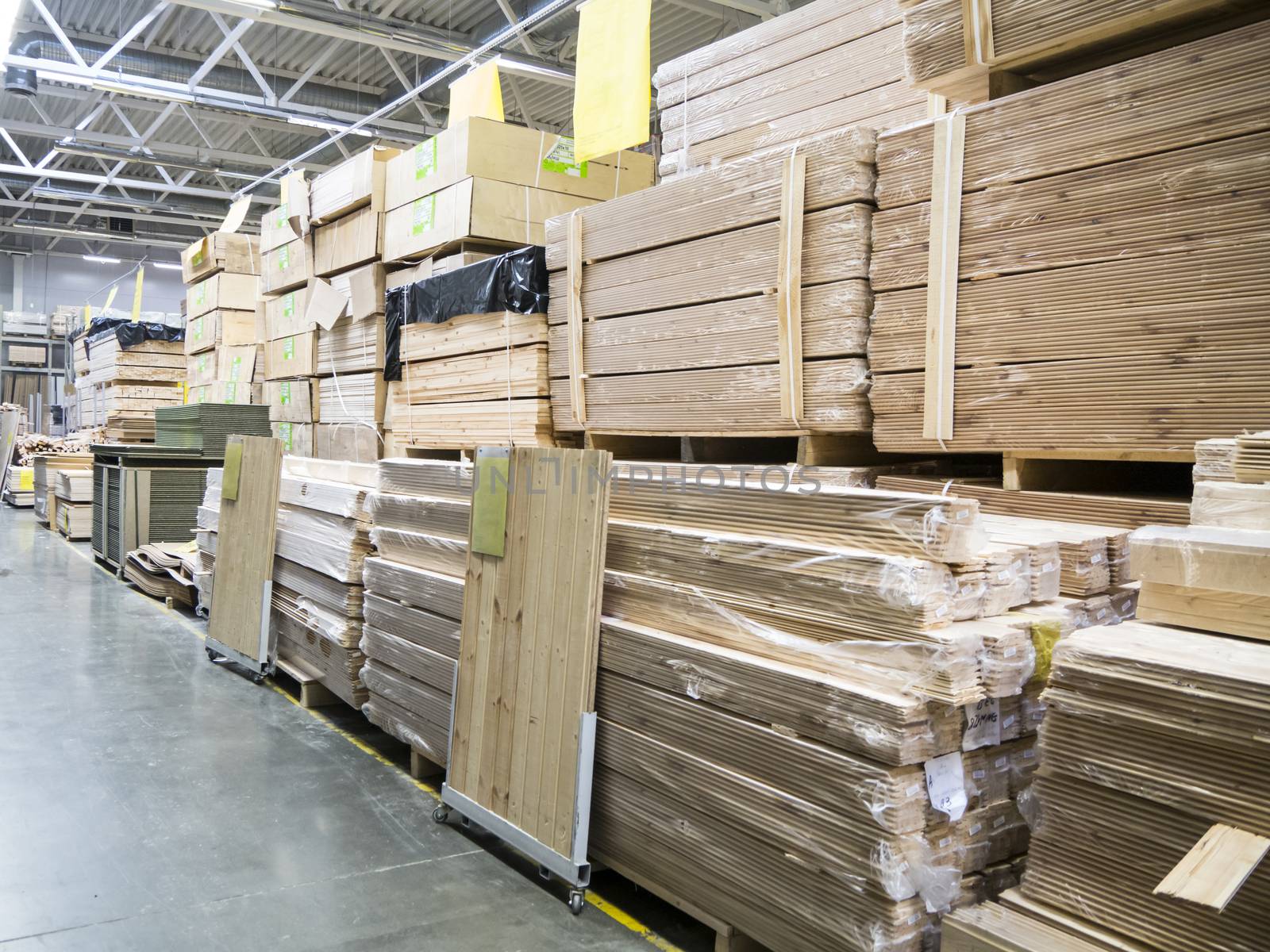 Large furniture warehouse of industial store. Warehouse of building materials shop