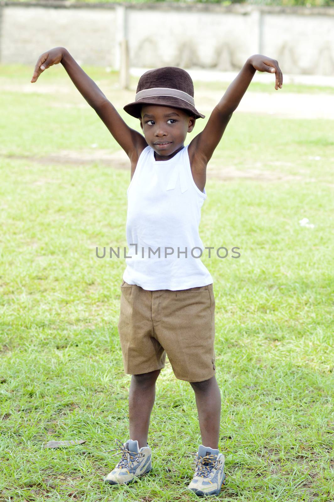 This child is training  on a sport field