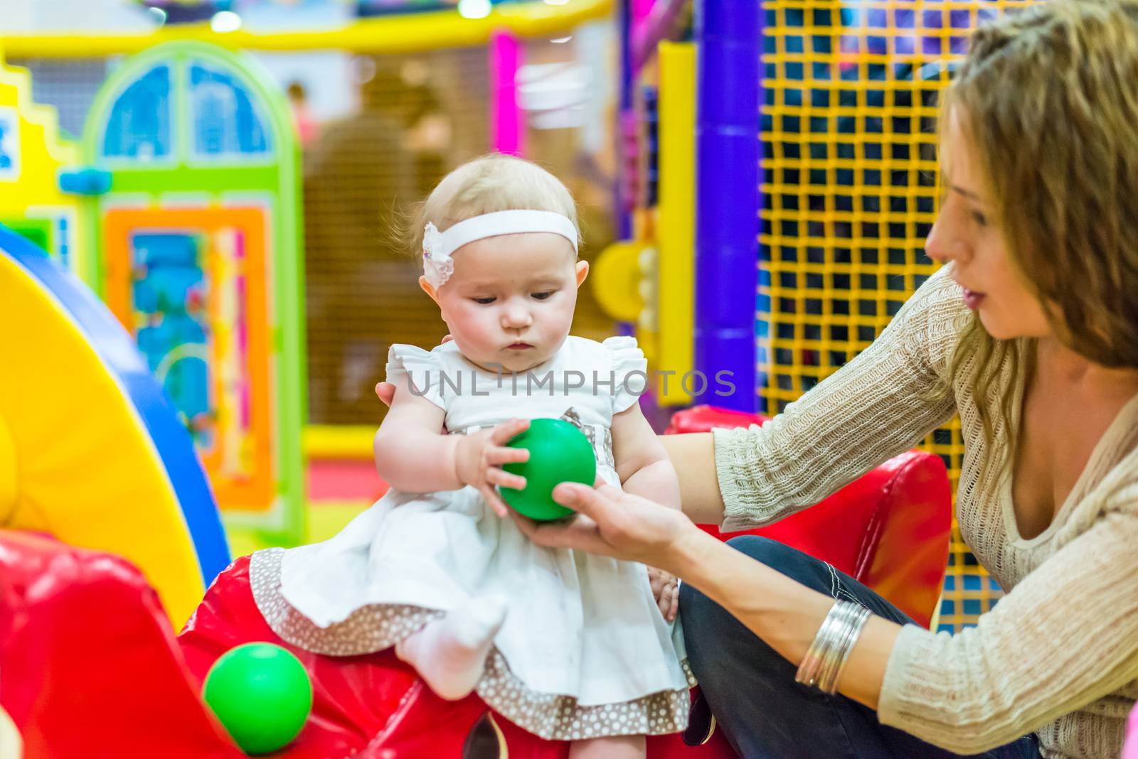 mother and child play in the children's room