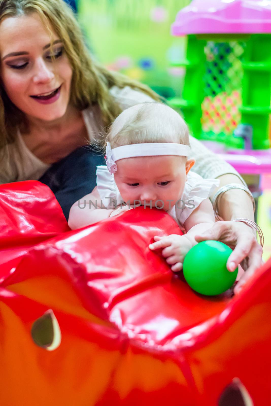 mother and child play in the children's room