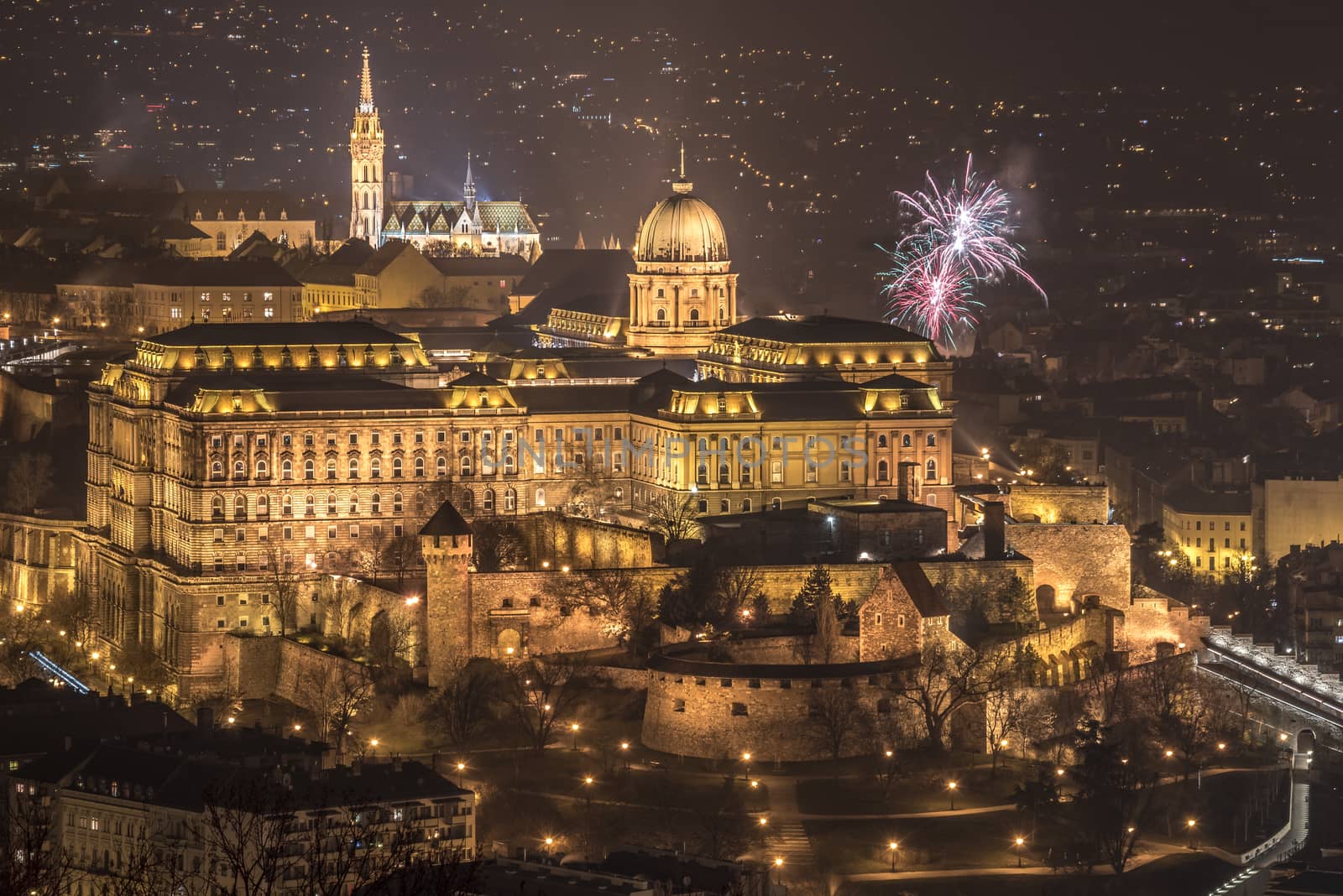 Buda Castle or Royal Palace in Budapest, Hungary with Fireworks at Night