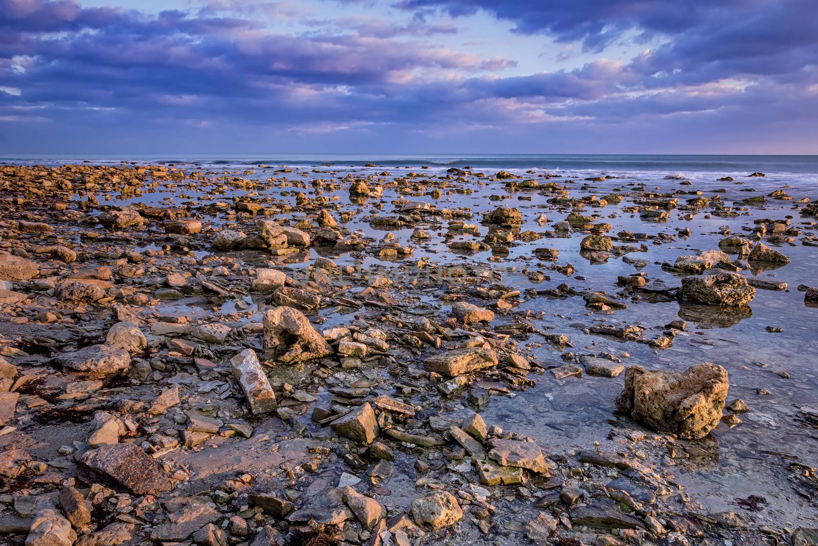 tranquility and calm long exposure rocky coast day view