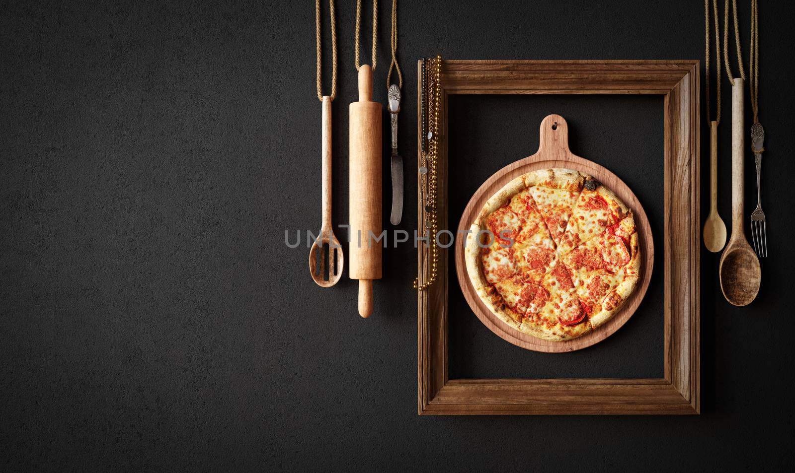 Hot pizza slice with kitchen tools and frame concept close up photo by denisgo