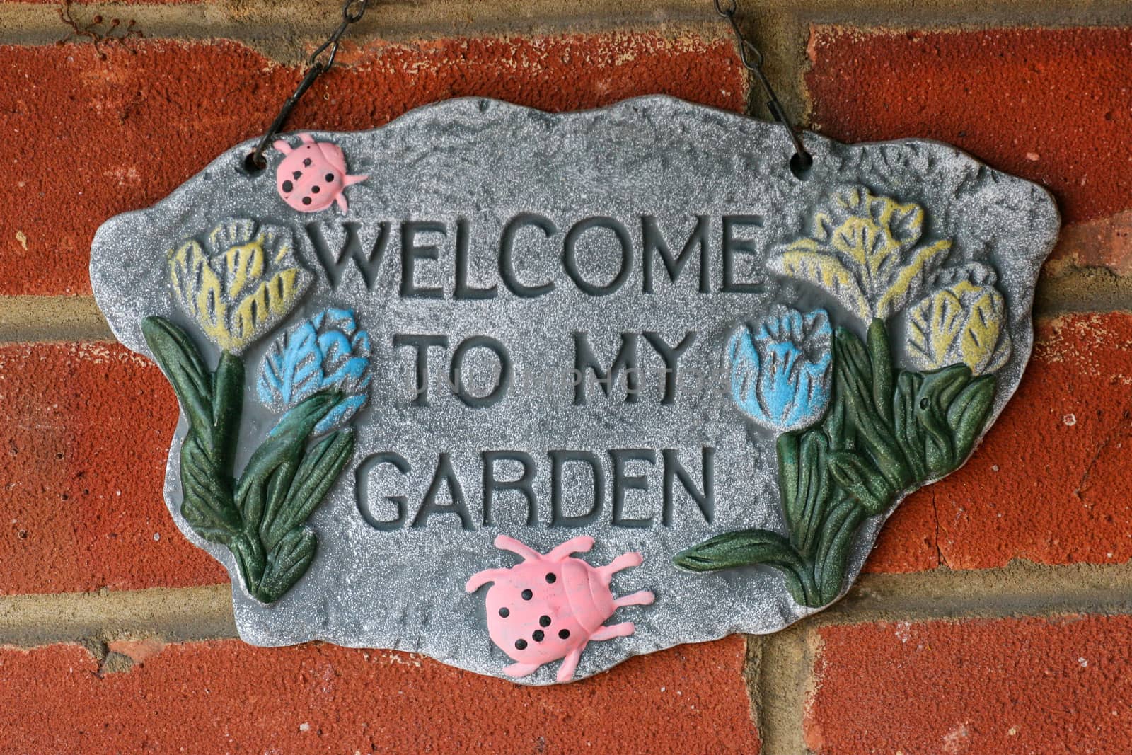 A sign saying Welcome to my Garden