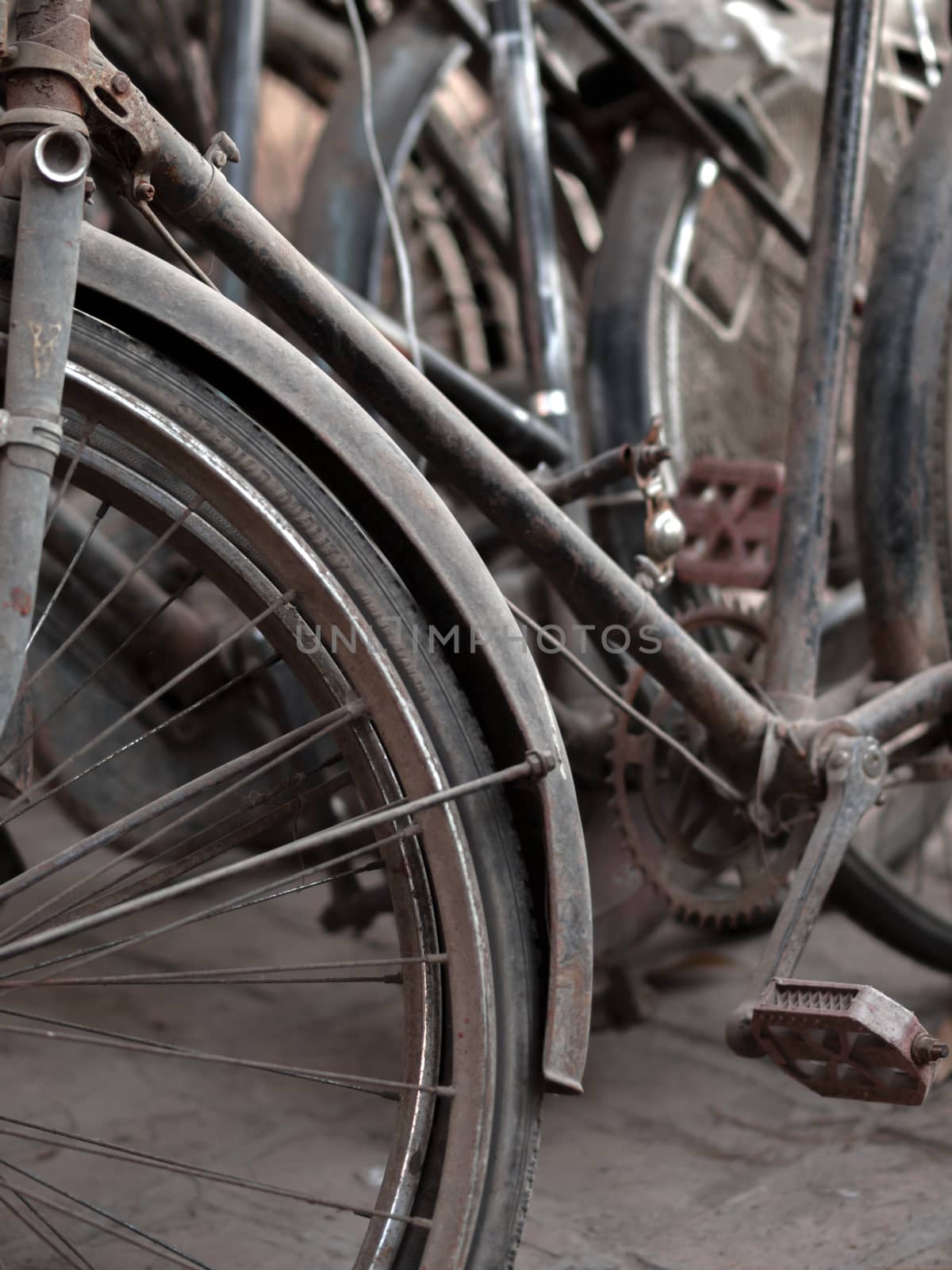 ABSTRACT SHOT OF OLD RUSTY BICYCLE PARTS by PrettyTG