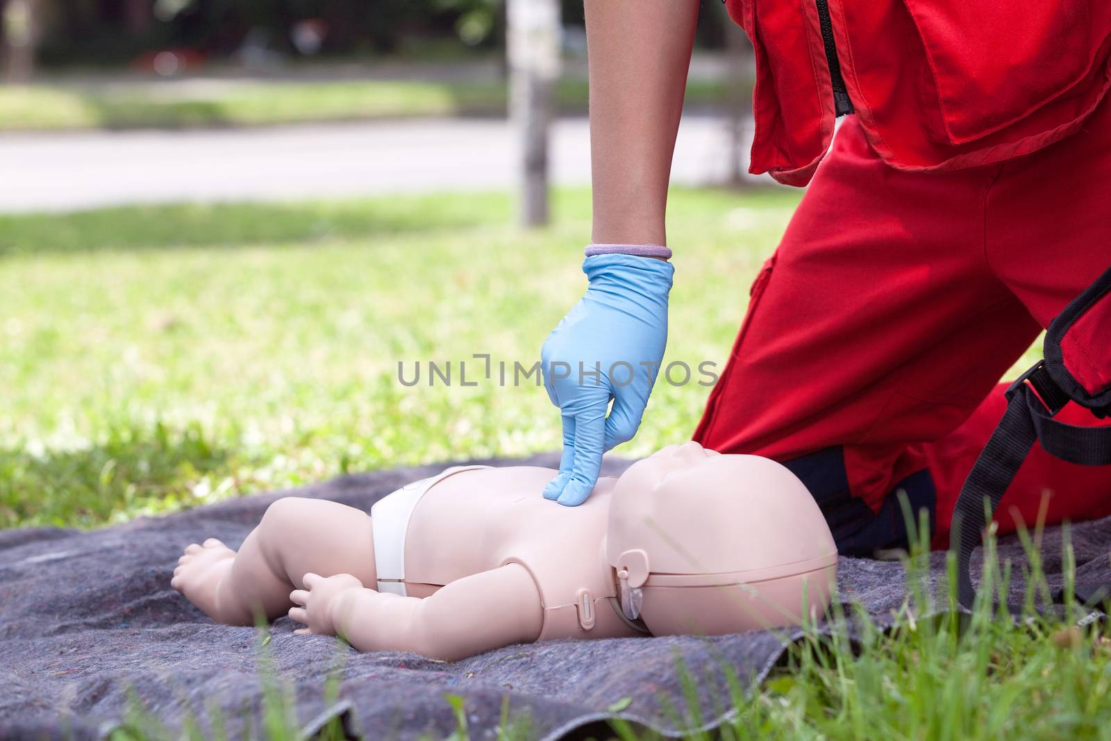 Baby CPR dummy first aid training. Cardiopulmonary resuscitation by wellphoto