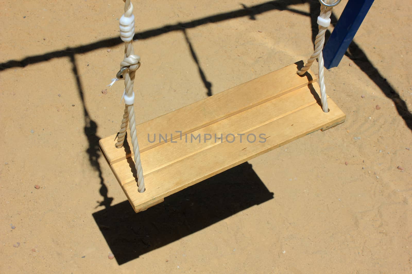 Seat from wooden boards on a children's swing