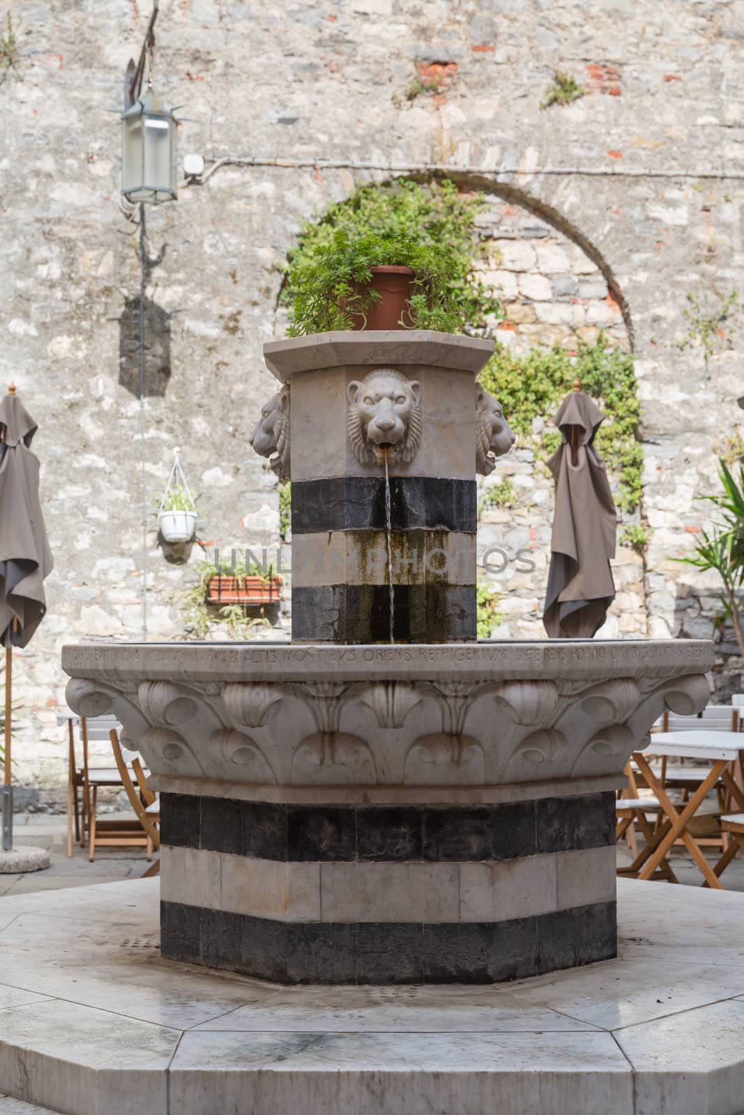 Fountain in Portovenere in the Ligurian region of Italy by chrisukphoto