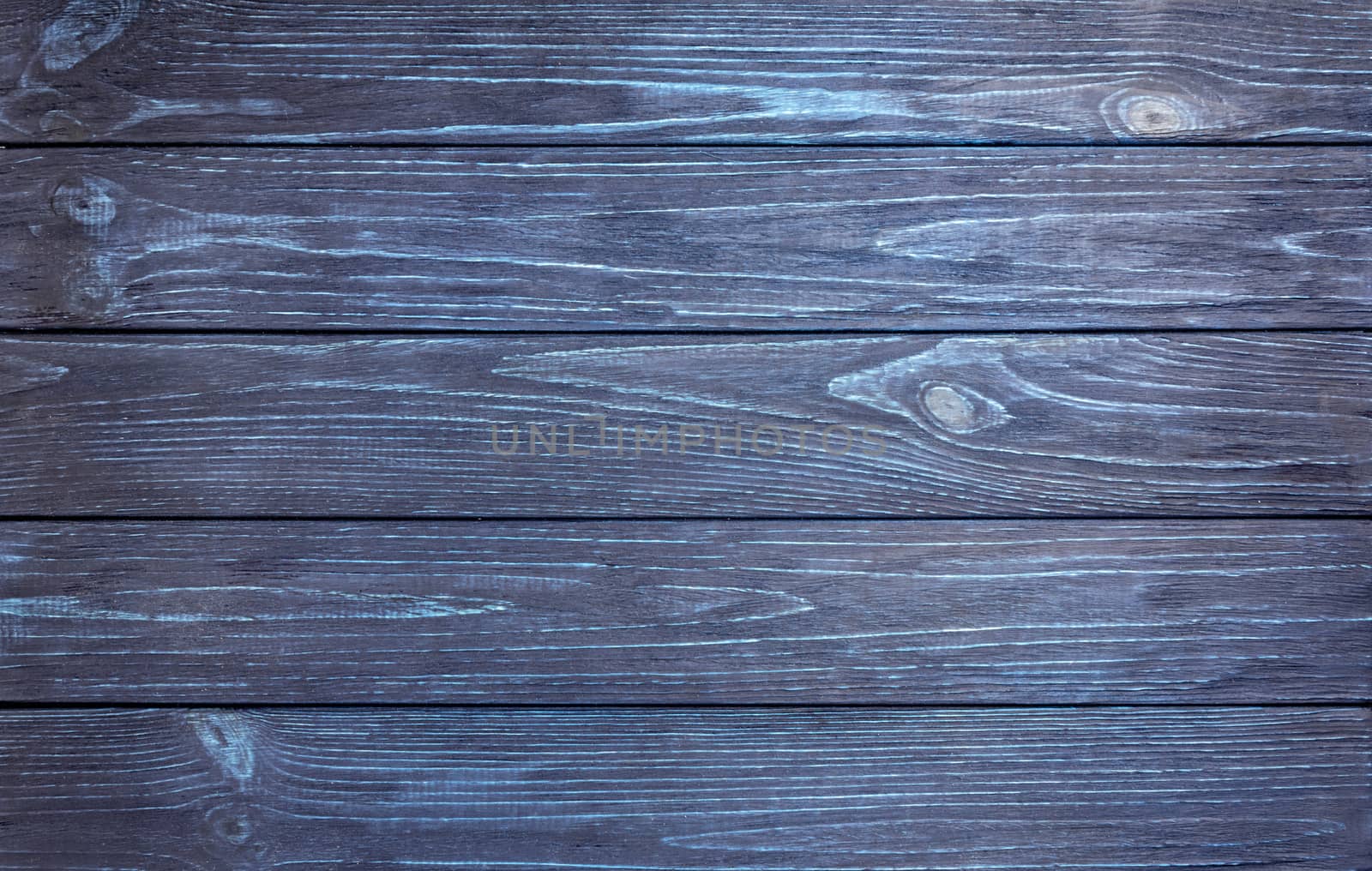 Wooden opaque background from boards of identical width. Top view.Space for an object