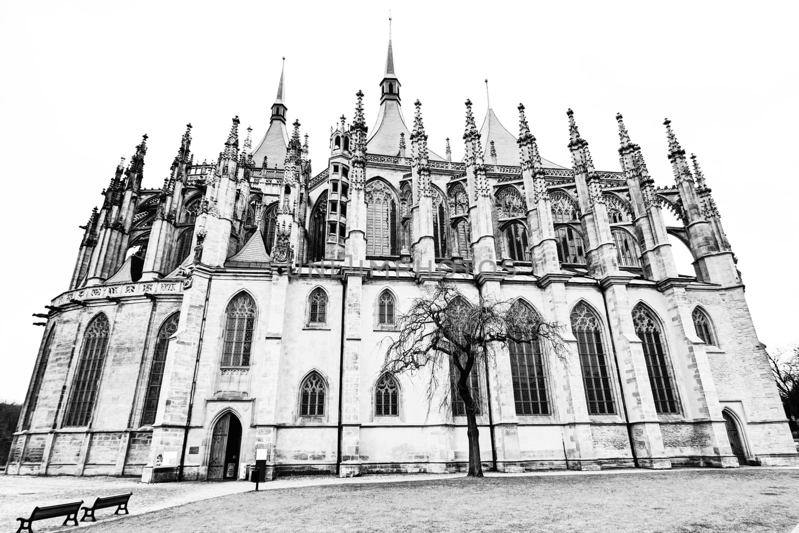 Saint Barbara's Church (often incorrectly Saint Barbara Cathedral) in Kutna Hora (Bohemia) is one of the most famous Gothic churches in central Europe and it is a UNESCO world heritage site. St Barbara is the patron saint of miners (among others), which was highly appropriate for a town whose wealth was based entirely upon its silver mines.Construction began in 1388, but because work on the church was interrupted several times, it was not completed until 1905. The first architect was probably Johann Parler, son of Peter Parler, but studies say that Peter Parler had participated at least as a co-author of the draft design. Work on the building was interrupted for more than 60 years during the Hussite Wars and when work resumed in 1482, Matej Rejsek and Benedikt Rejt, two architects from Prague, assumed responsibility. Kutna Hora, Czech republic.